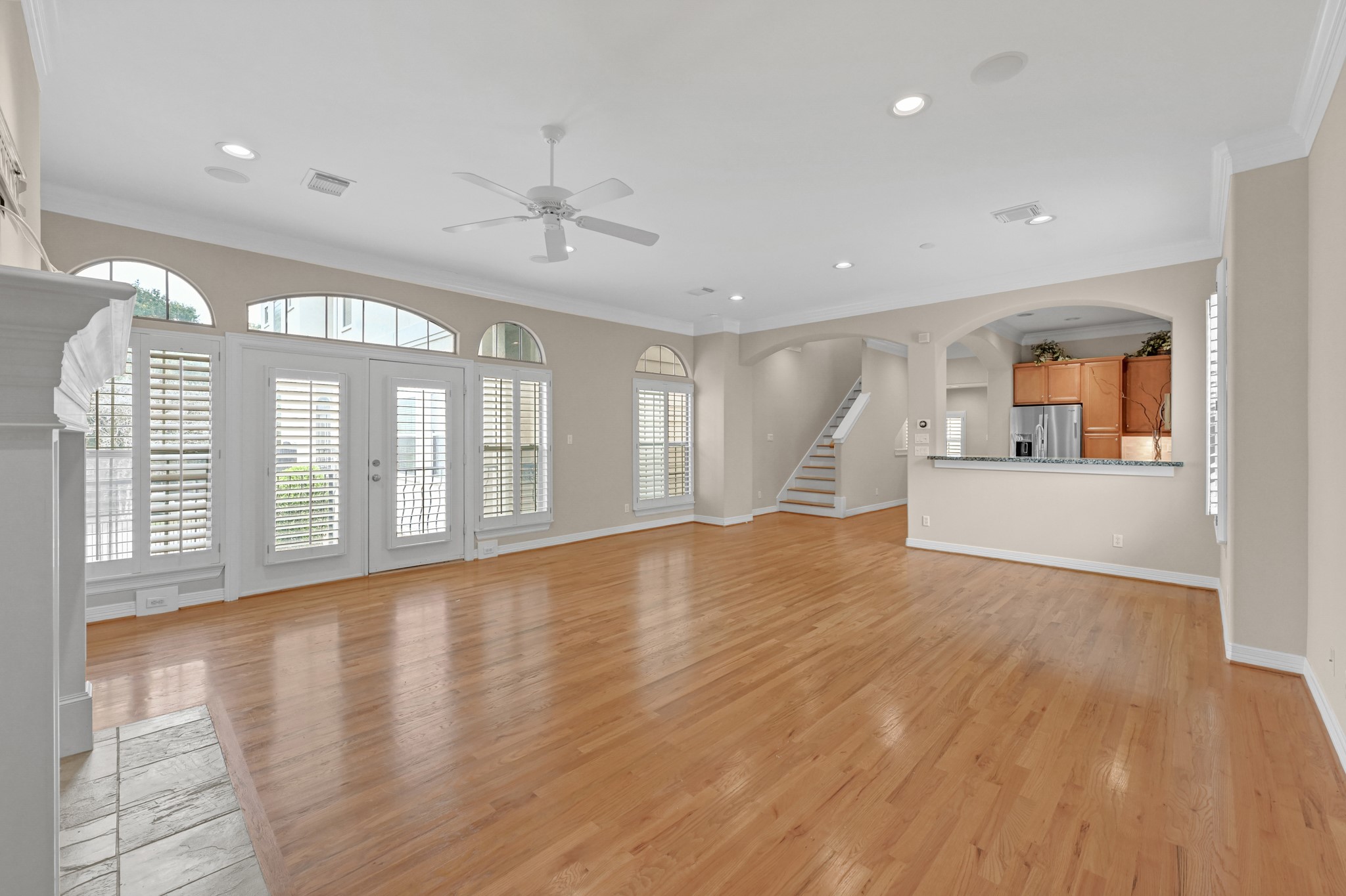 1204 Cohn Street Houston, TX 77007 - Photo 11 of 25 a view of empty room with wooden floor and fan