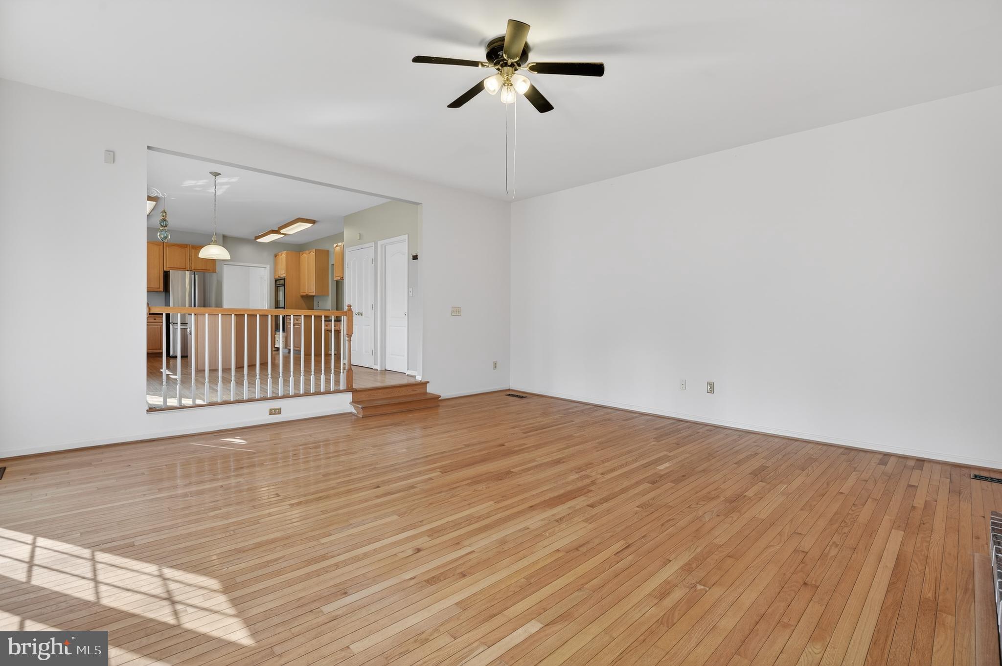 13106 Quail Creek Court Silver Spring, MD 20904 - Photo 13 of 43 wooden floor in an empty room