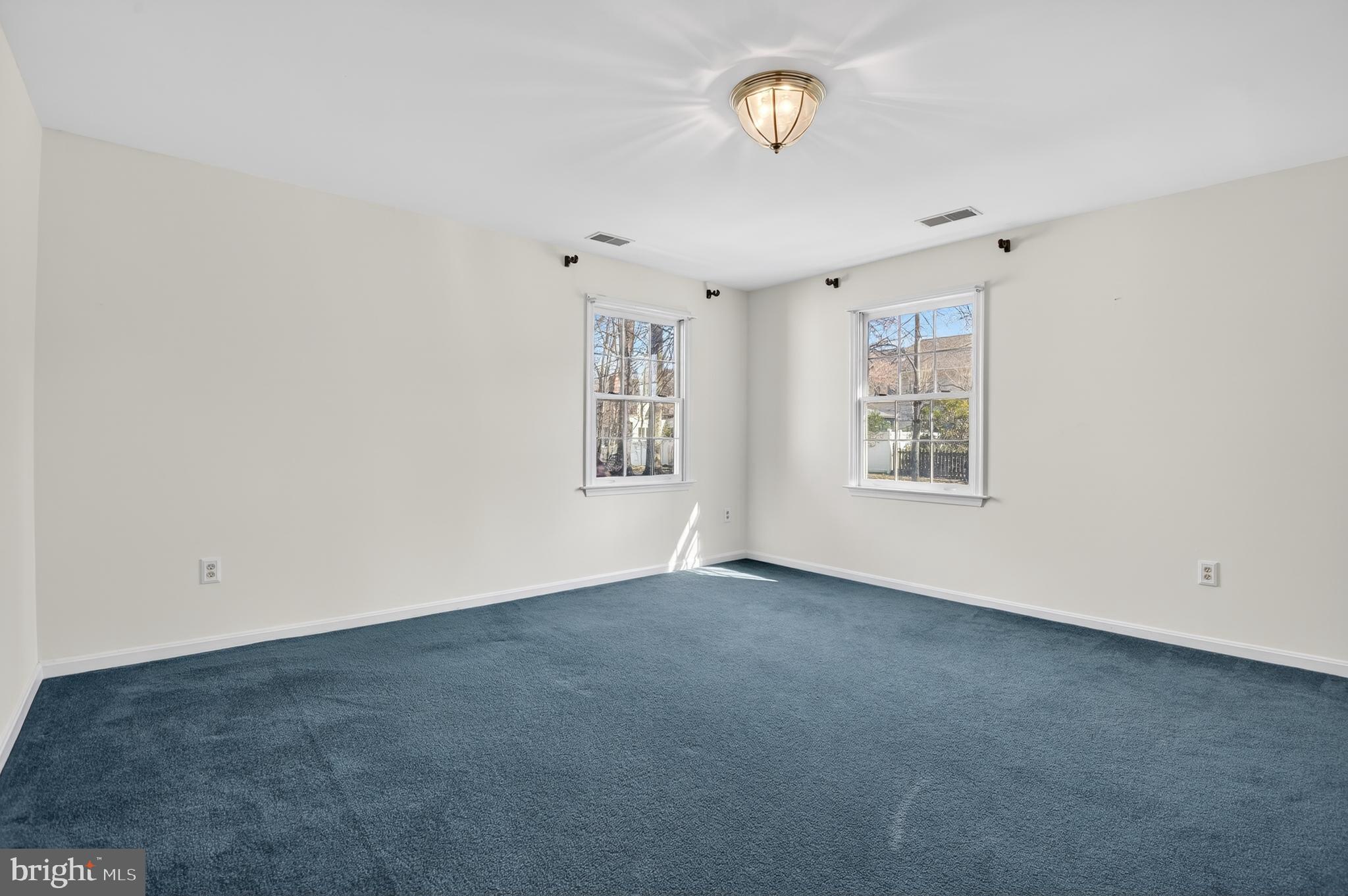 13106 Quail Creek Court Silver Spring, MD 20904 - Photo 31 of 43 an empty room with windows