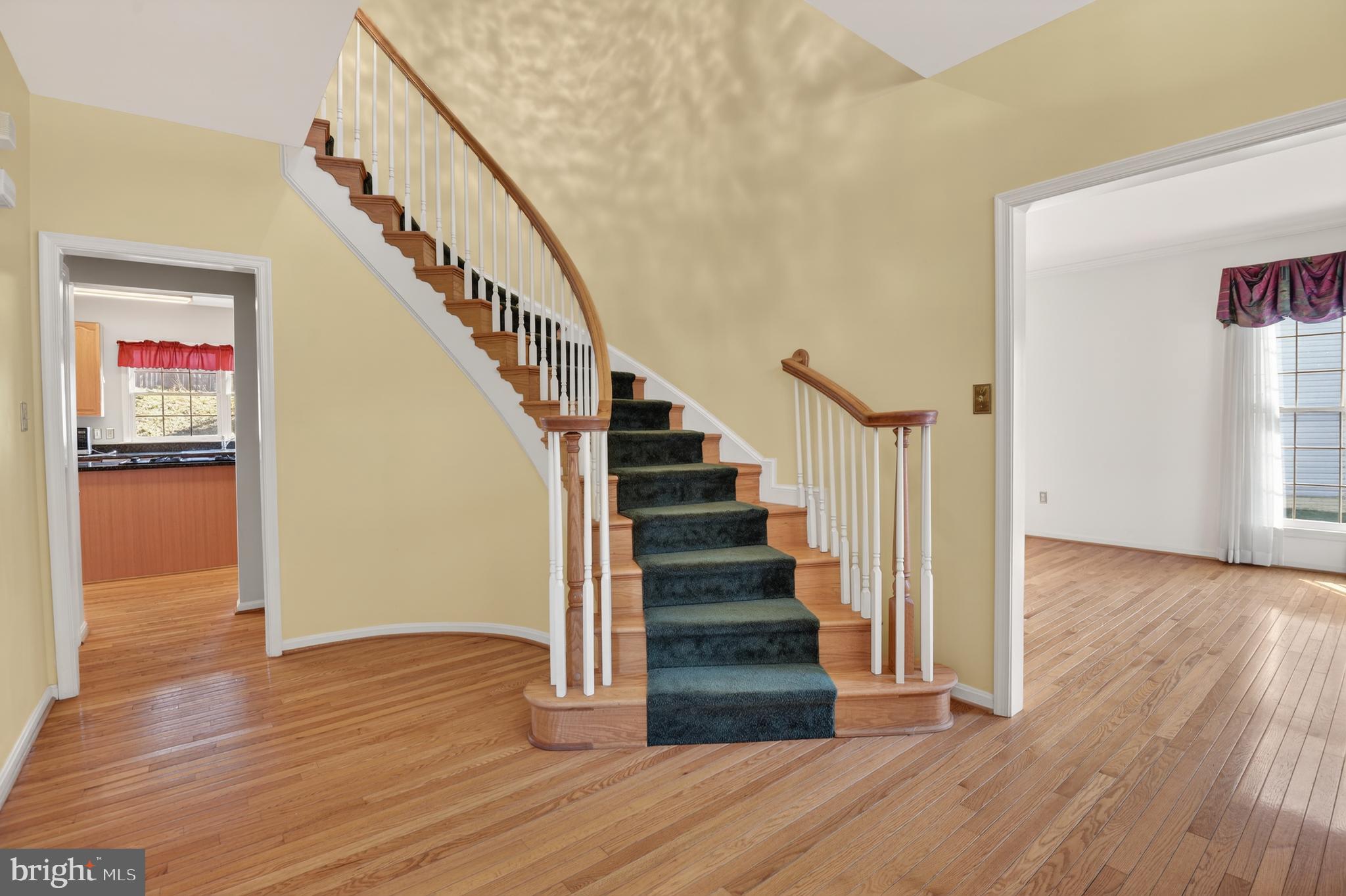 13106 Quail Creek Court Silver Spring, MD 20904 - Photo 5 of 43 a view of entryway with wooden floor