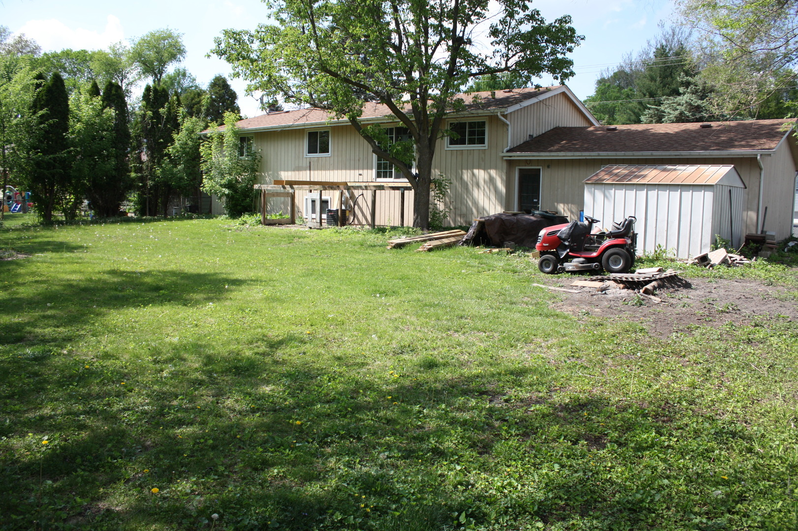 345 Souwanas Trail Algonquin, IL 60102 - Photo 14 of 16 a view of a house with backyard and sitting area