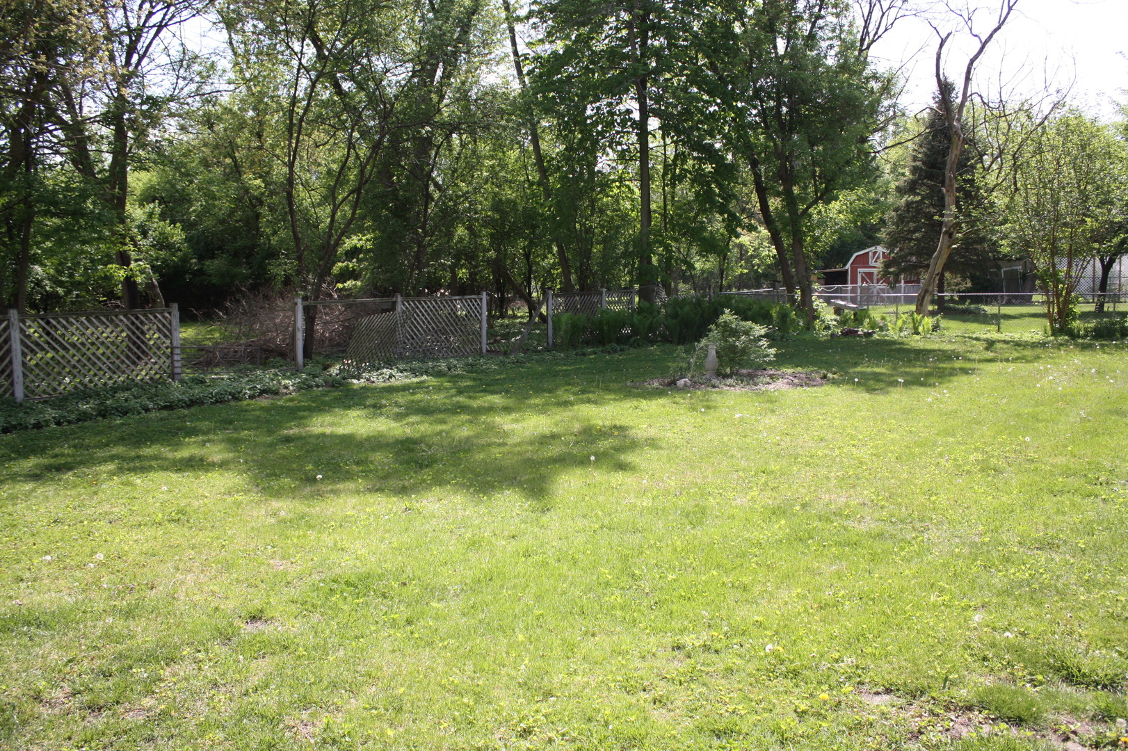 345 Souwanas Trail Algonquin, IL 60102 - Photo 15 of 16 a view of outdoor space with deck and green space