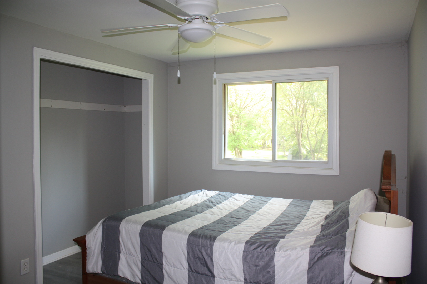 345 Souwanas Trail Algonquin, IL 60102 - Photo 6 of 16 a bedroom with a bed and a window