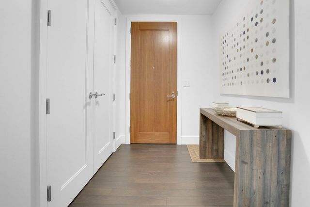 a view of a hallway with entryway