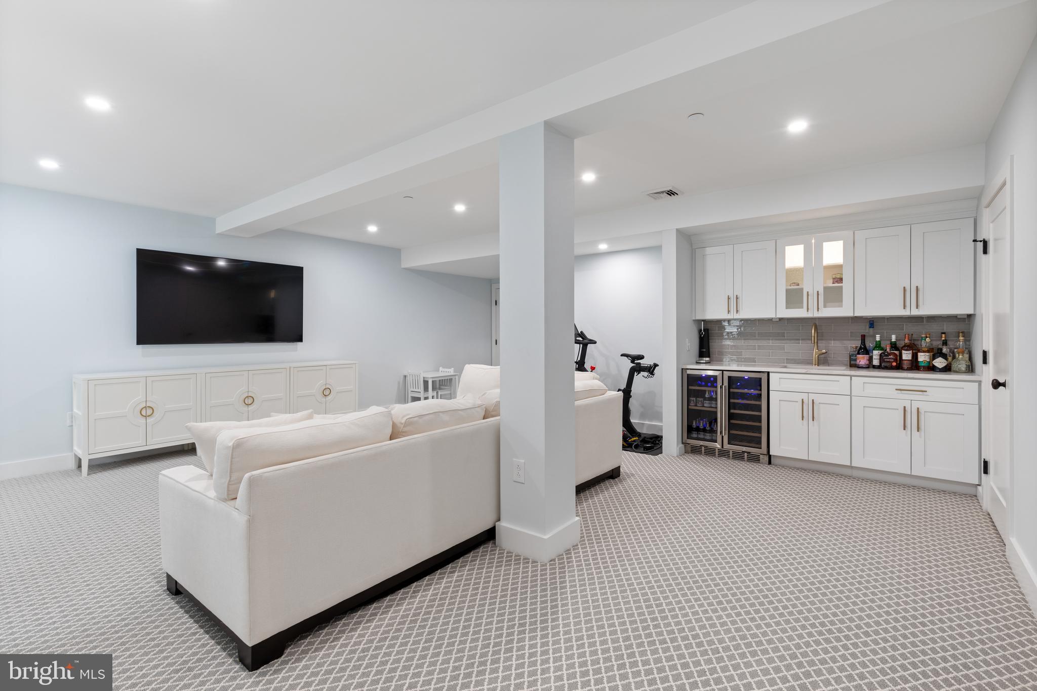 662 Levering Street Blue Bell, PA 19422 - Photo 23 of 31 a living room with furniture and a flat screen tv