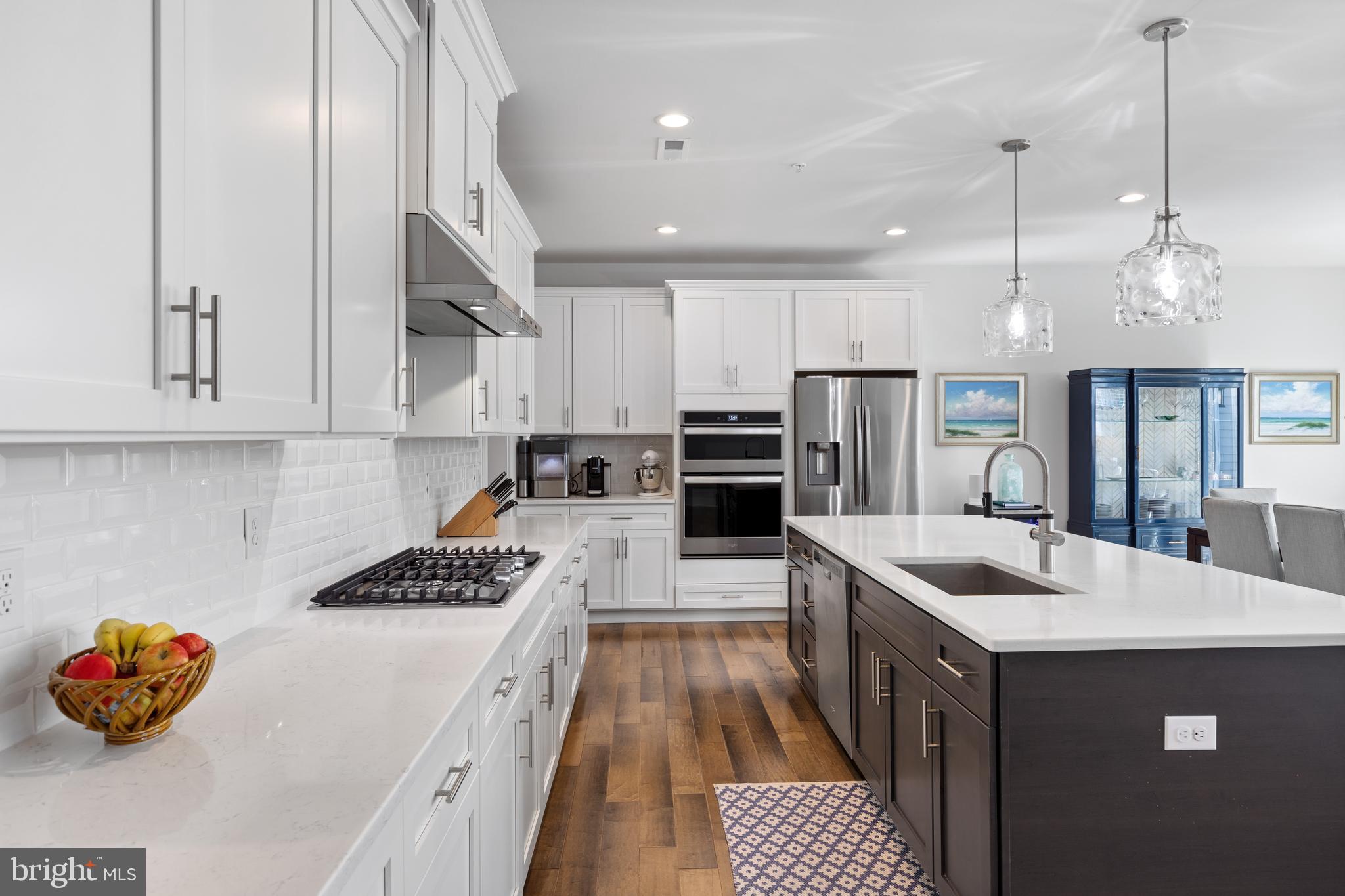 662 Levering Street Blue Bell, PA 19422 - Photo 3 of 31 a kitchen with stainless steel appliances granite countertop a sink stove and refrigerator