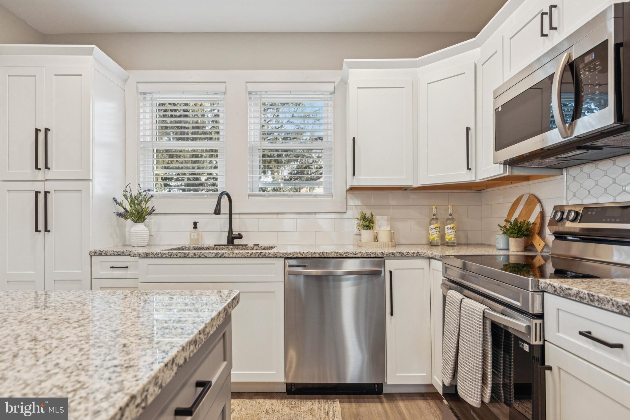 343 Pawlings Road Phoenixville, PA 19460 - Photo 17 of 33 Remodeled Kitchen with Stainless Steel Appliances