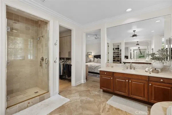 a bathroom with a sink a vanity and a mirror