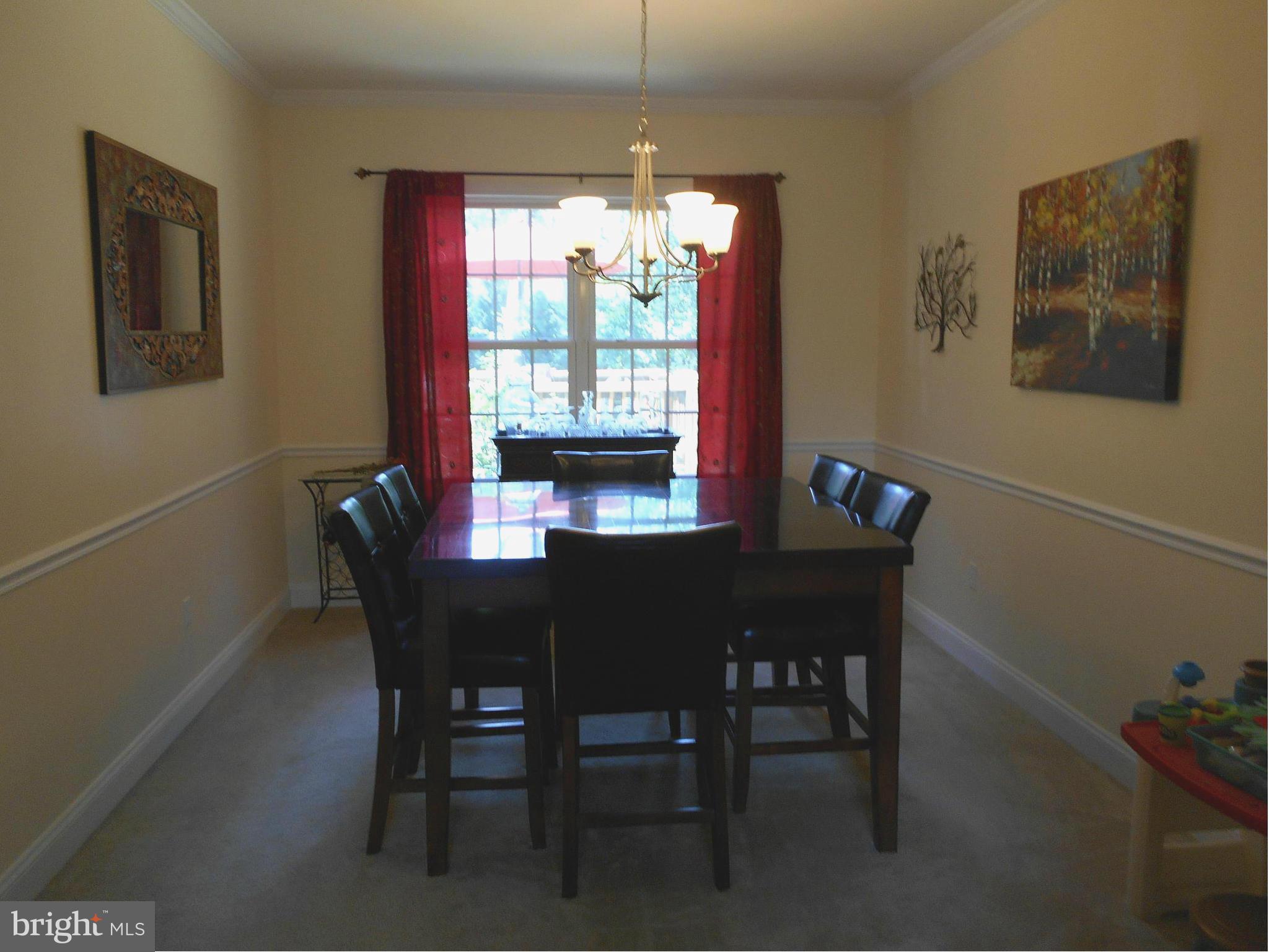 7726 Locust Wood Road Severn, MD 21144 - Photo 8 of 23 a dining room with furniture and window