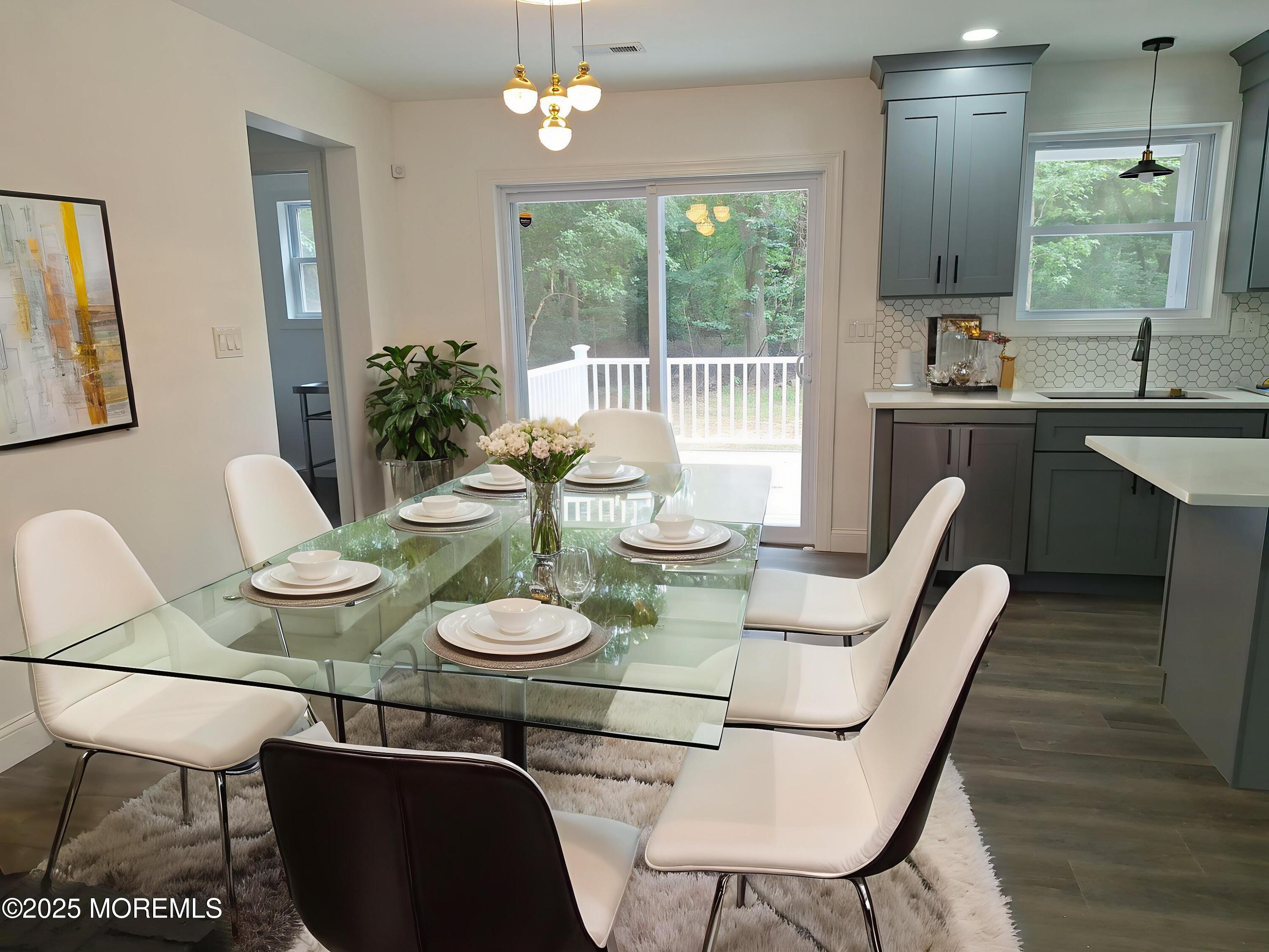 414 Oak Tree Road Freehold, NJ 07728 - Photo 13 of 25 a view of a dining room with furniture window and outside view