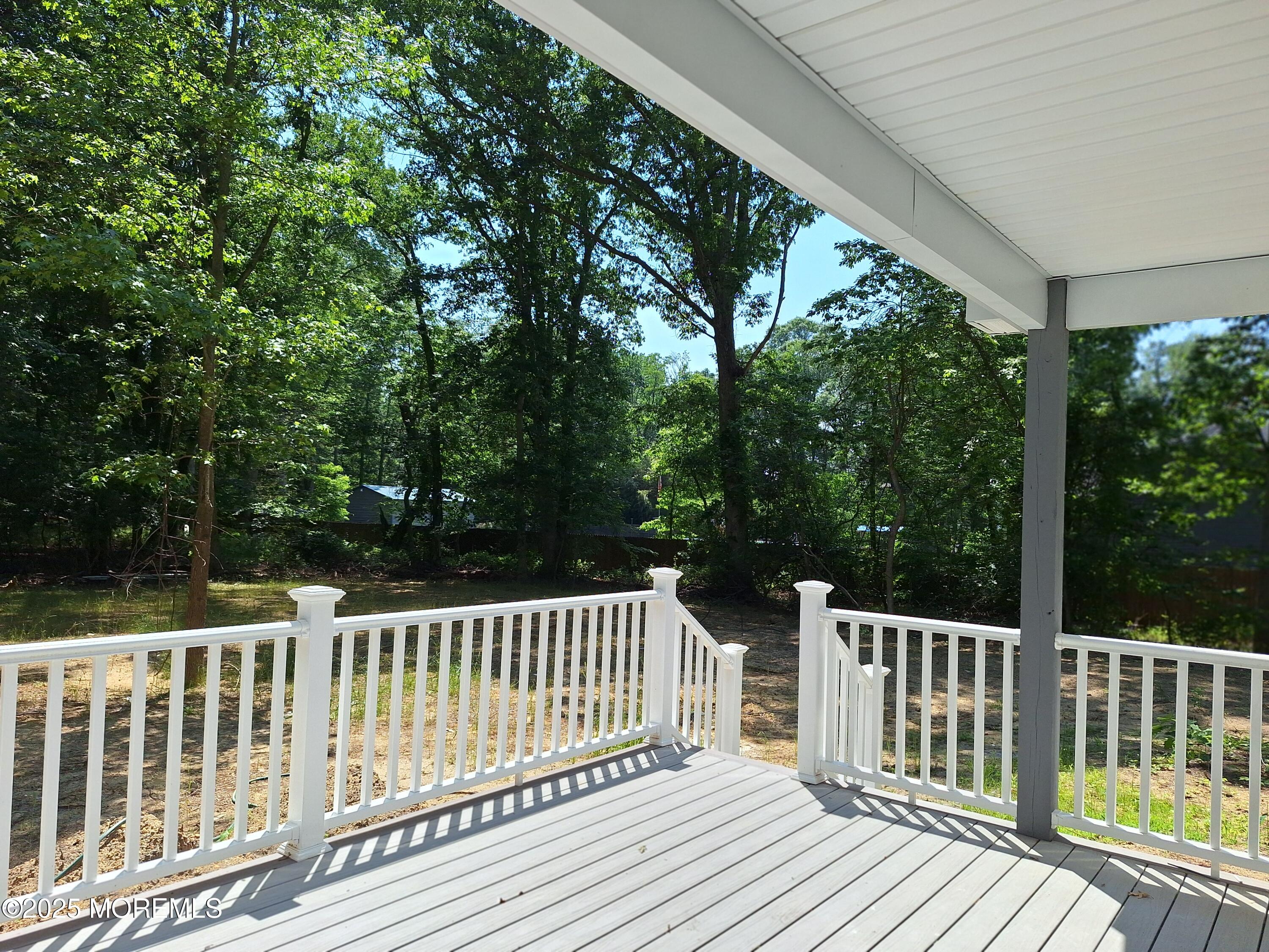 414 Oak Tree Road Freehold, NJ 07728 - Photo 22 of 25 a view of a wooden deck