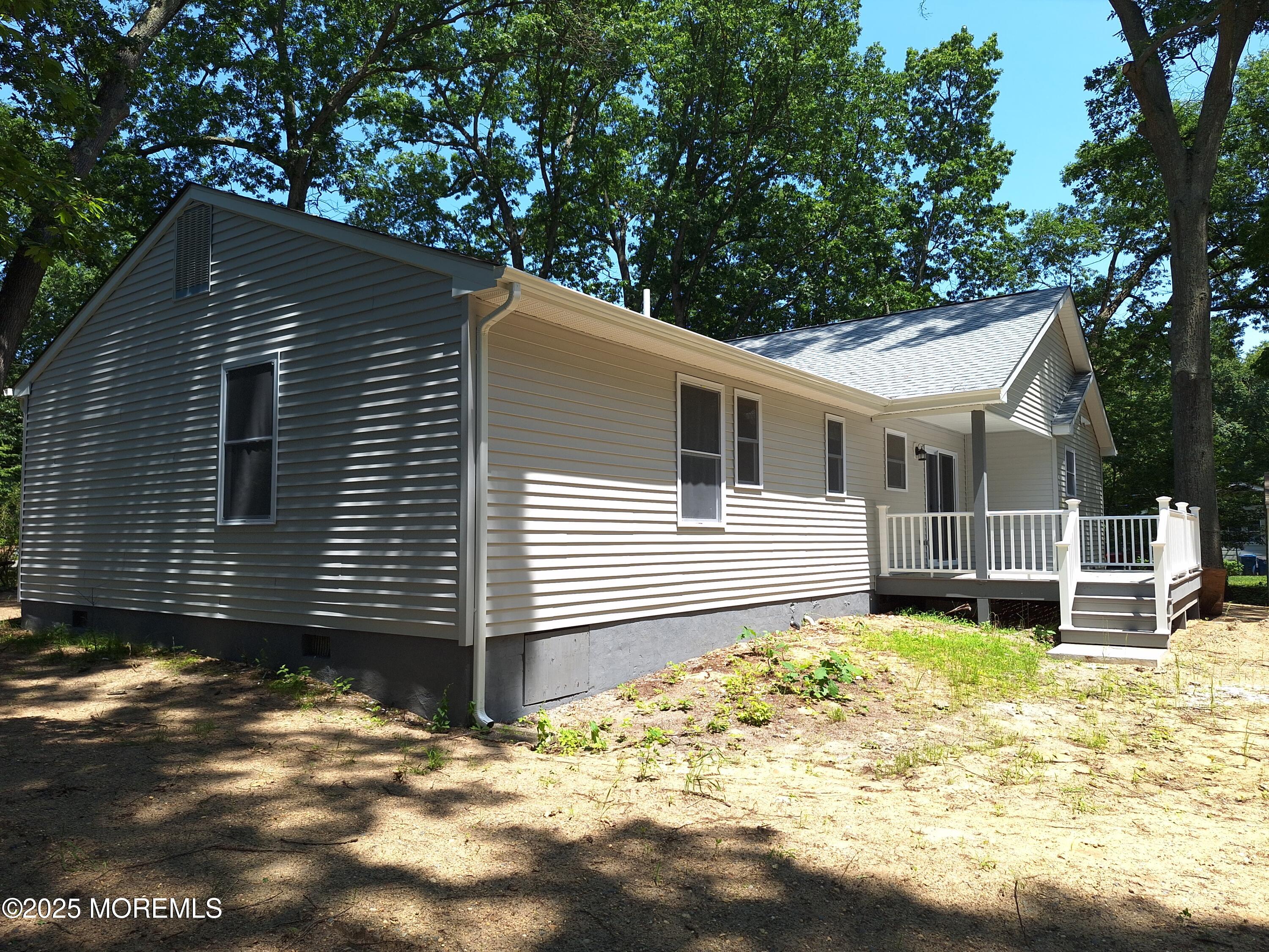 414 Oak Tree Road Freehold, NJ 07728 - Photo 25 of 25 a front view of a house with a yard