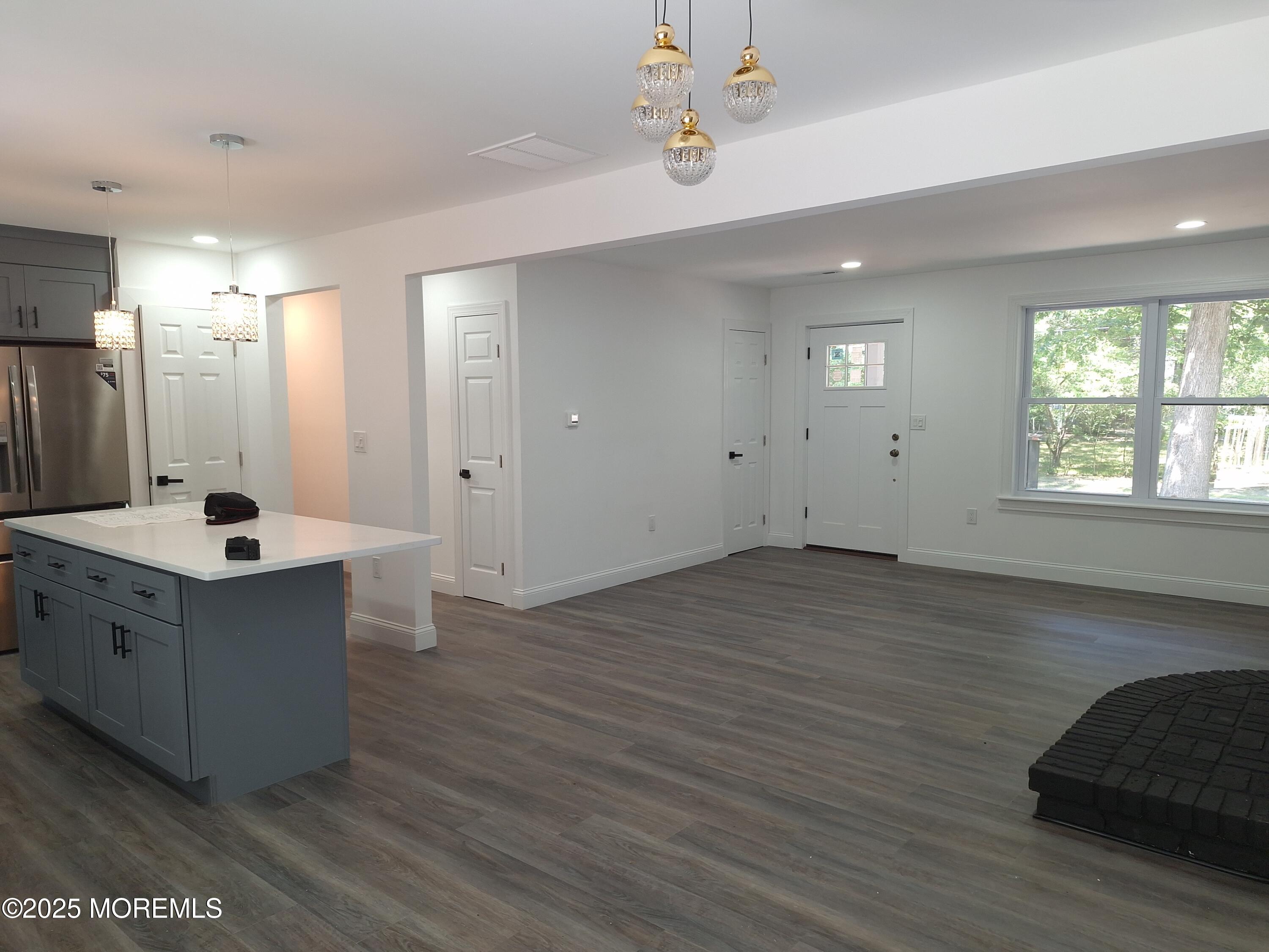 414 Oak Tree Road Freehold, NJ 07728 - Photo 9 of 25 a view of kitchen with sink window and refrigerator