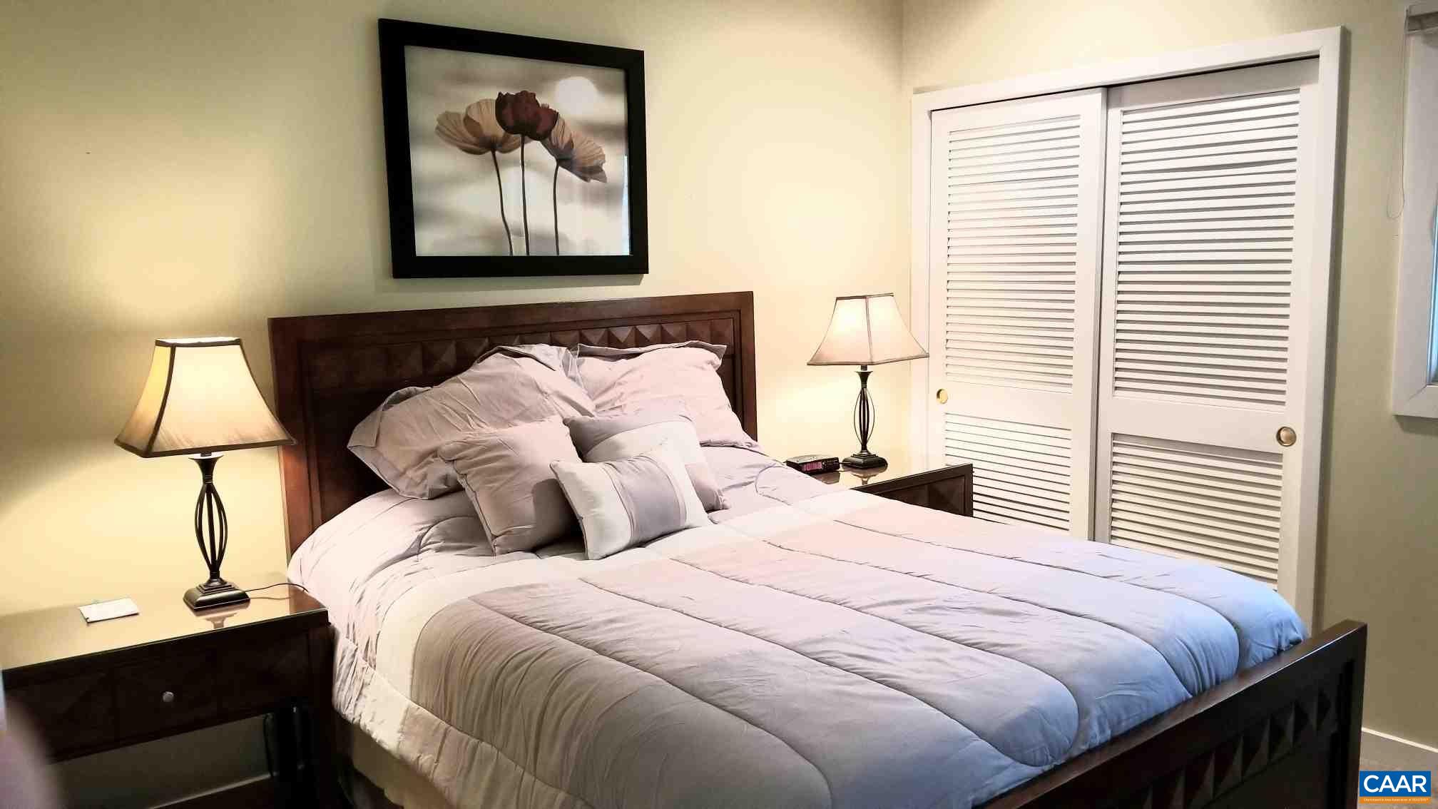 1722 High Ridge Roseland, VA 22967 - Photo 16 of 23 a bedroom with a bed and a window