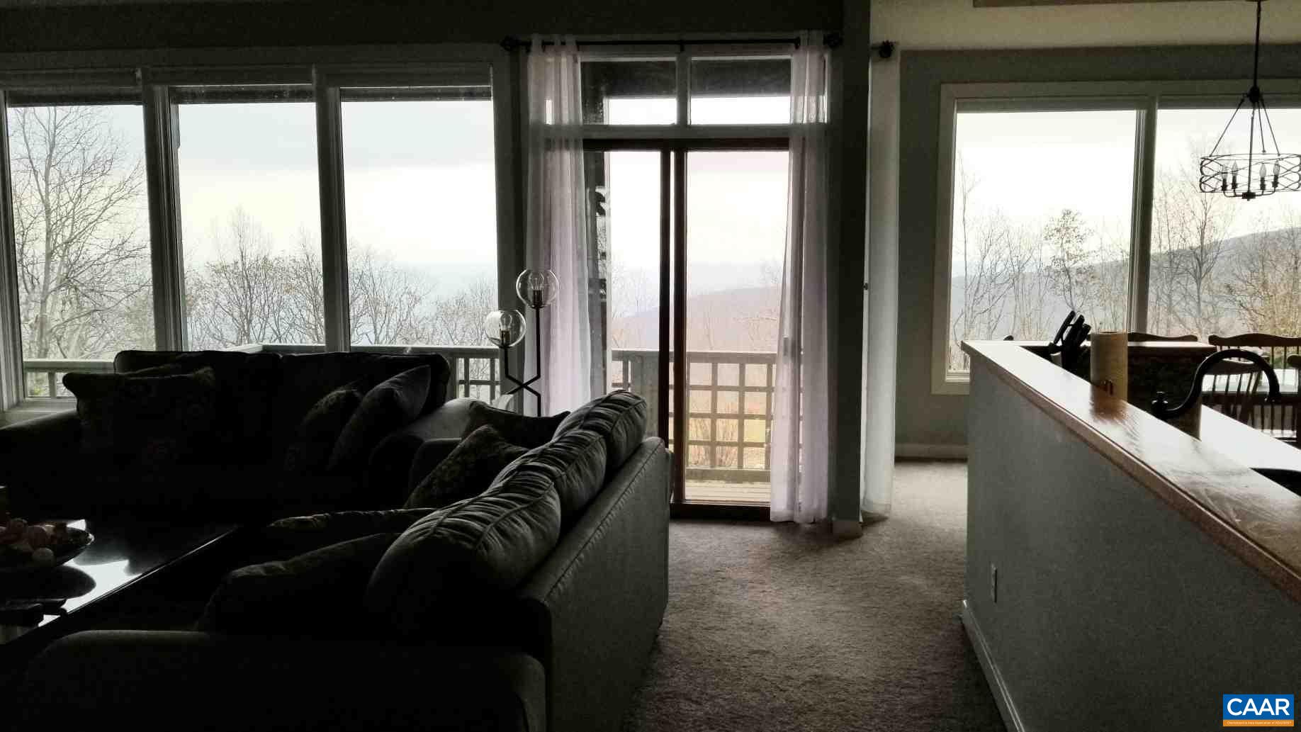 1722 High Ridge Roseland, VA 22967 - Photo 23 of 23 a living room with furniture and a floor to ceiling window