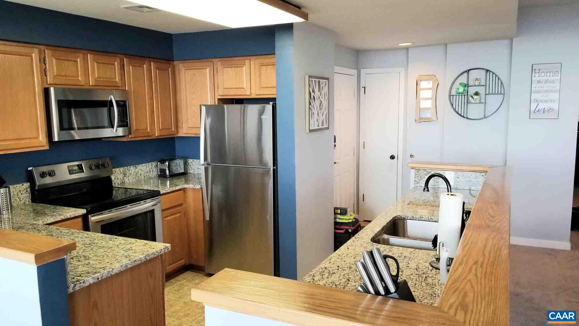 1722 High Ridge Roseland, VA 22967 - Photo 6 of 23 a kitchen with stainless steel appliances granite countertop a refrigerator a stove top oven a sink and dishwasher