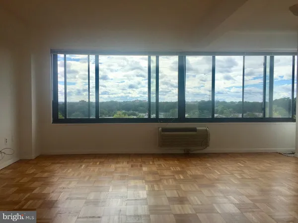 a view of an empty room with window