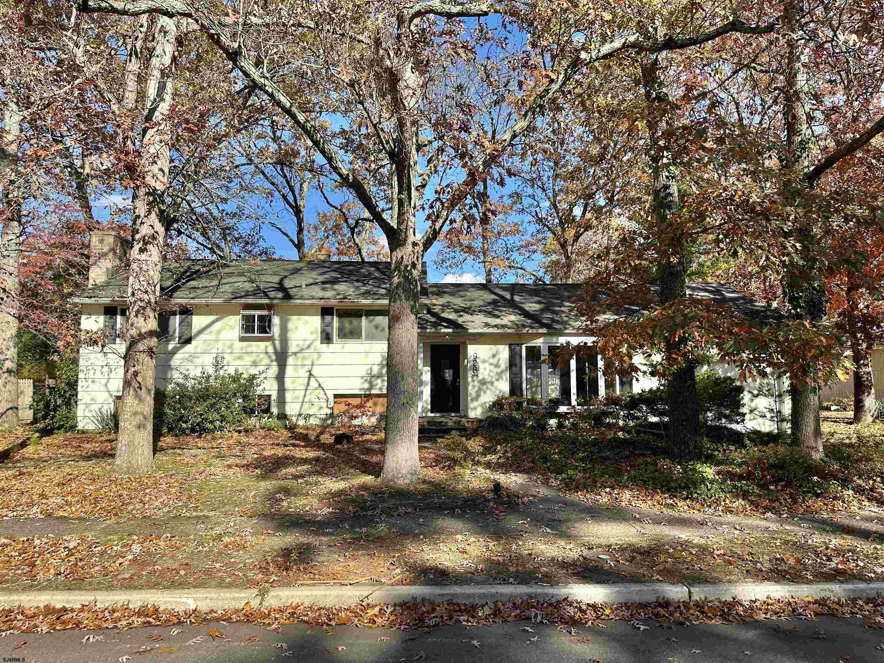 928 Traymore Parkway Absecon, NJ 08201 - Photo 1 of 25 a front view of a house with a tree