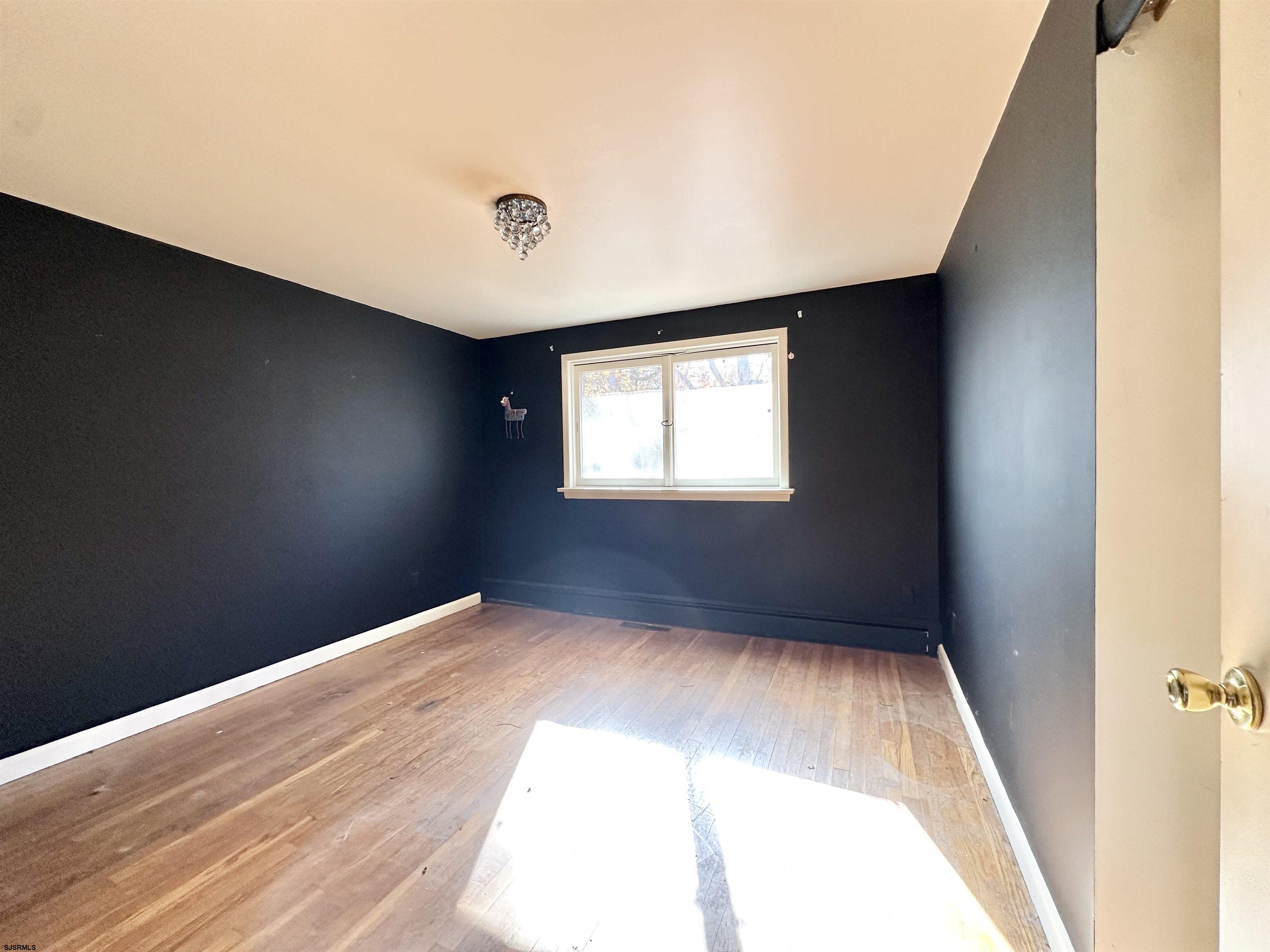 928 Traymore Parkway Absecon, NJ 08201 - Photo 19 of 25 a view of empty room with window