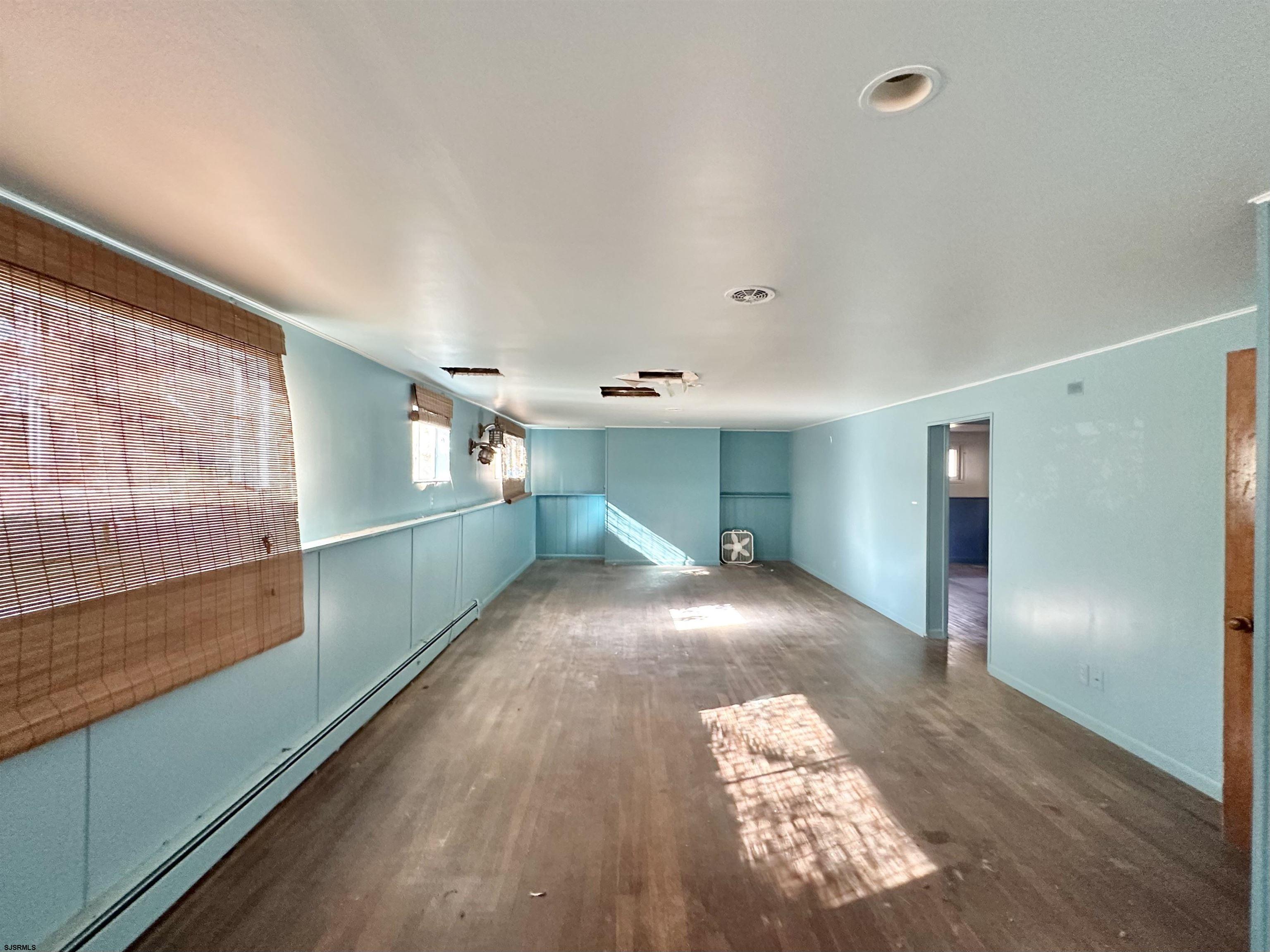 928 Traymore Parkway Absecon, NJ 08201 - Photo 23 of 25 a view of a hallway with seating area