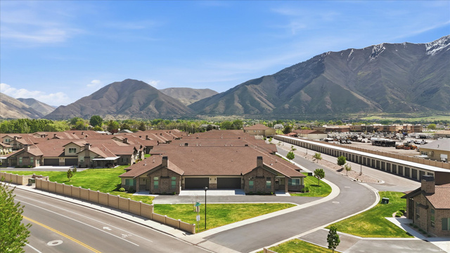 1838 West 300th Street South, Unit B Mapleton, UT 84664 - Photo 42 of 51 Expansive residential development featuring multiple units with brick exteriors and attached garages