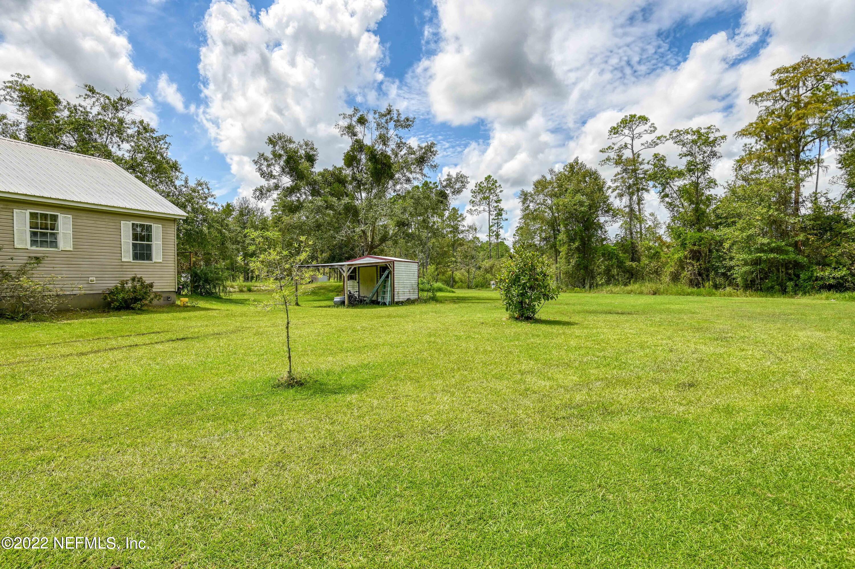 131 Musket Road Palatka, FL 32177 - Photo 30 of 35 Side yard