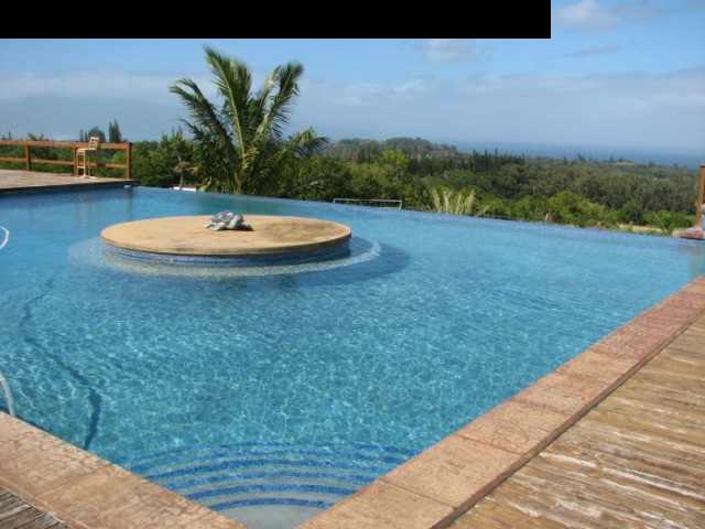 830 West Kuiaha Road Haiku, HI 96708 - Photo 4 of 15 a view of a swimming pool with a yard