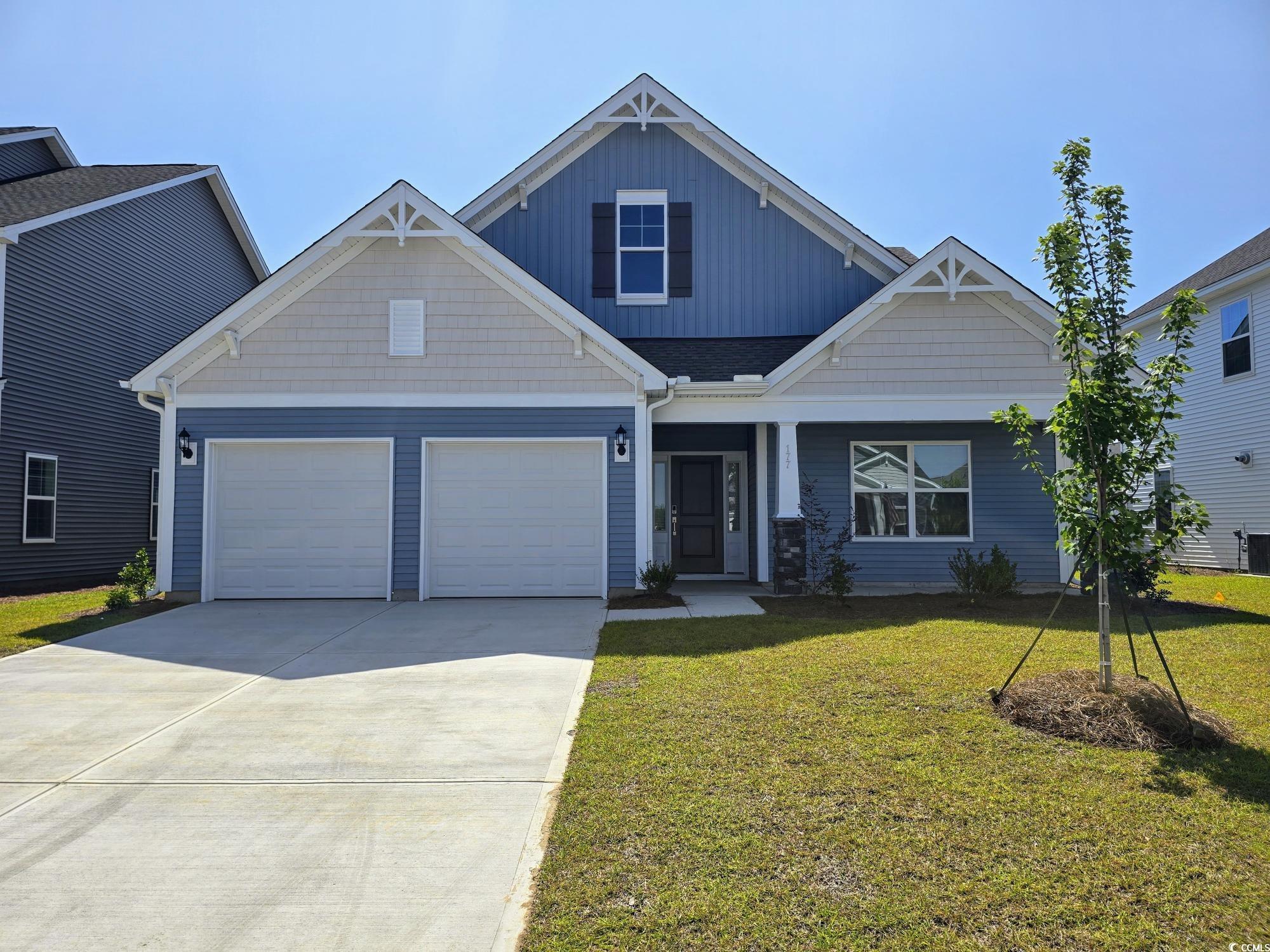 177 Azure Loop Myrtle Beach, SC 29588 - Photo 1 of 39 Craftsman house featuring concrete driveway, a fro