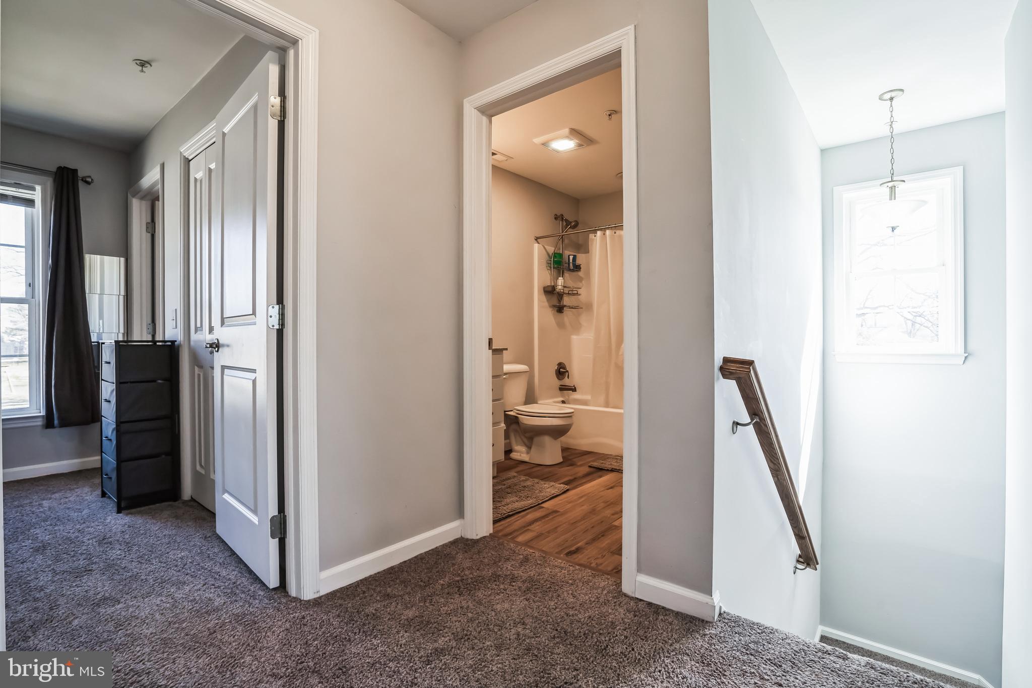 910 Rosedale Avenue Rosedale, MD 21237 - Photo 13 of 41 a view of a hallway view with three rooms