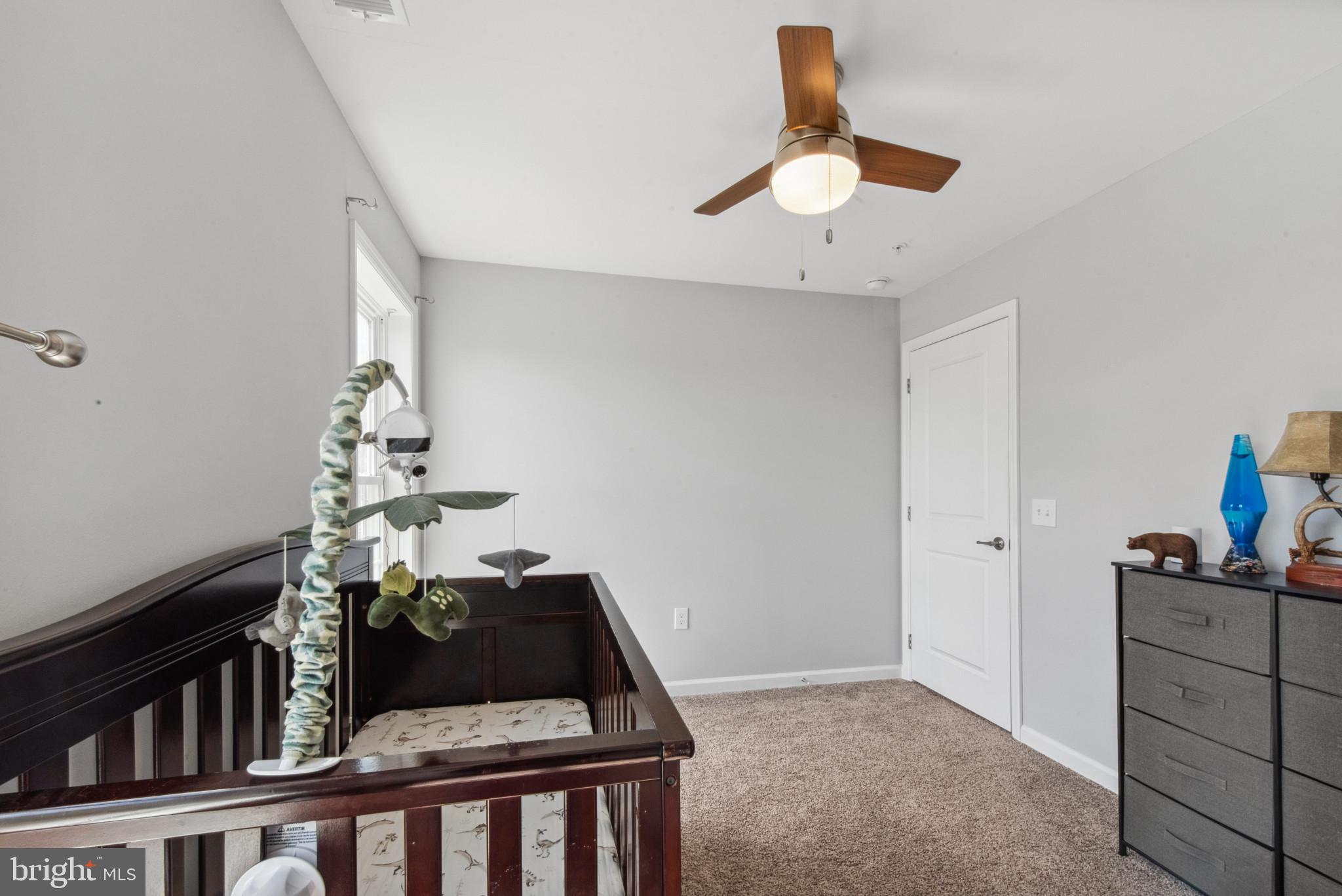 910 Rosedale Avenue Rosedale, MD 21237 - Photo 25 of 41 a living room with furniture and a window