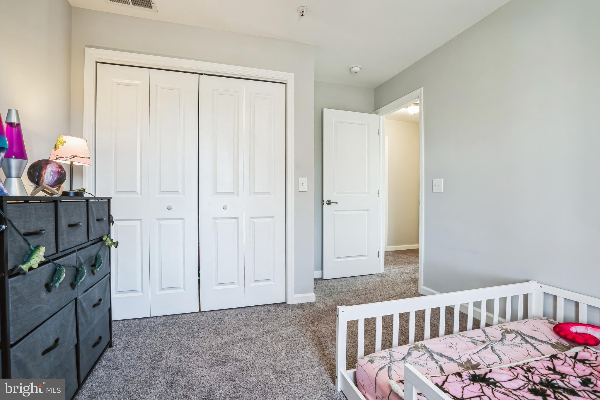 910 Rosedale Avenue Rosedale, MD 21237 - Photo 29 of 41 a view of a bedroom with baby crib