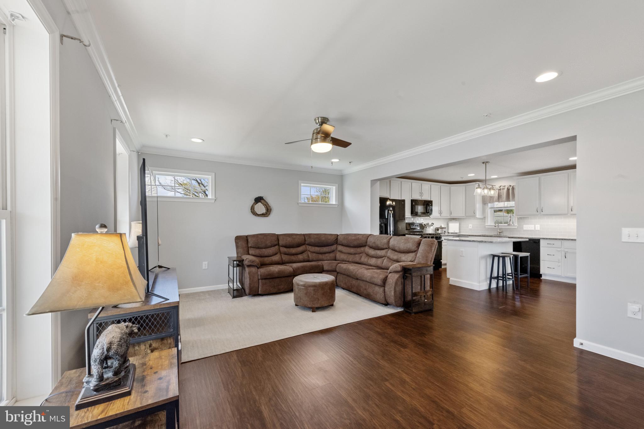 910 Rosedale Avenue Rosedale, MD 21237 - Photo 6 of 41 a living room with furniture and a flat screen tv