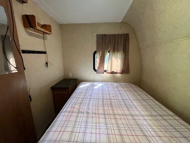 a sign that is on the side of a tree