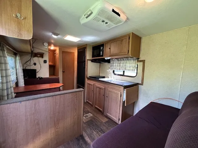 a view of a livingroom with furniture