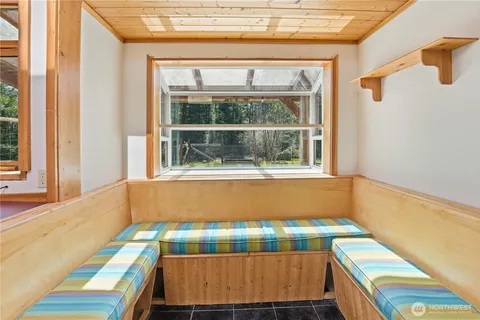 a room with furniture and a window