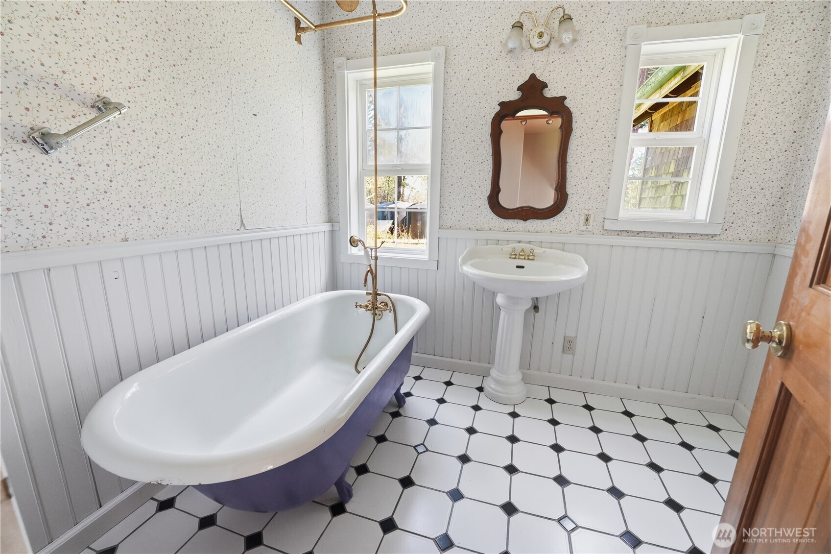 1763 Center Road Lopez Island, WA 98261 - Photo 14 of 40 a bathroom with a sink toilet and mirror