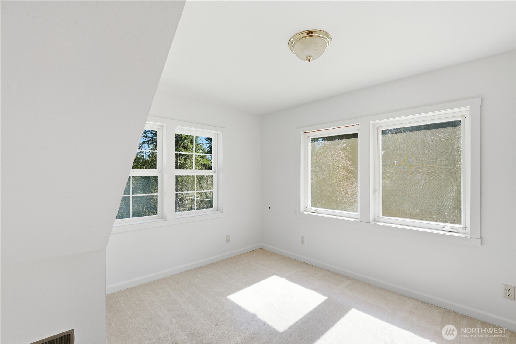 1763 Center Road Lopez Island, WA 98261 - Photo 19 of 40 an empty room with a window
