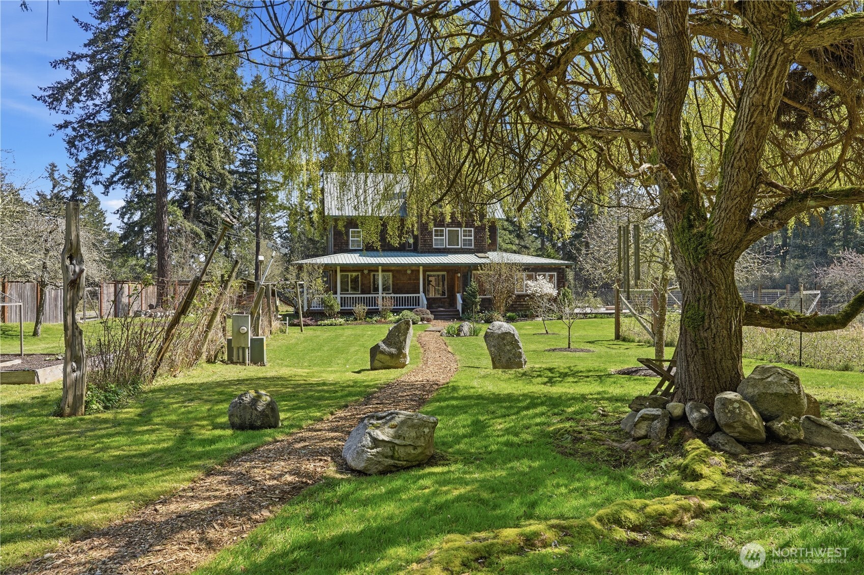 1763 Center Road Lopez Island, WA 98261 - Photo 2 of 40 a view of a park with large trees