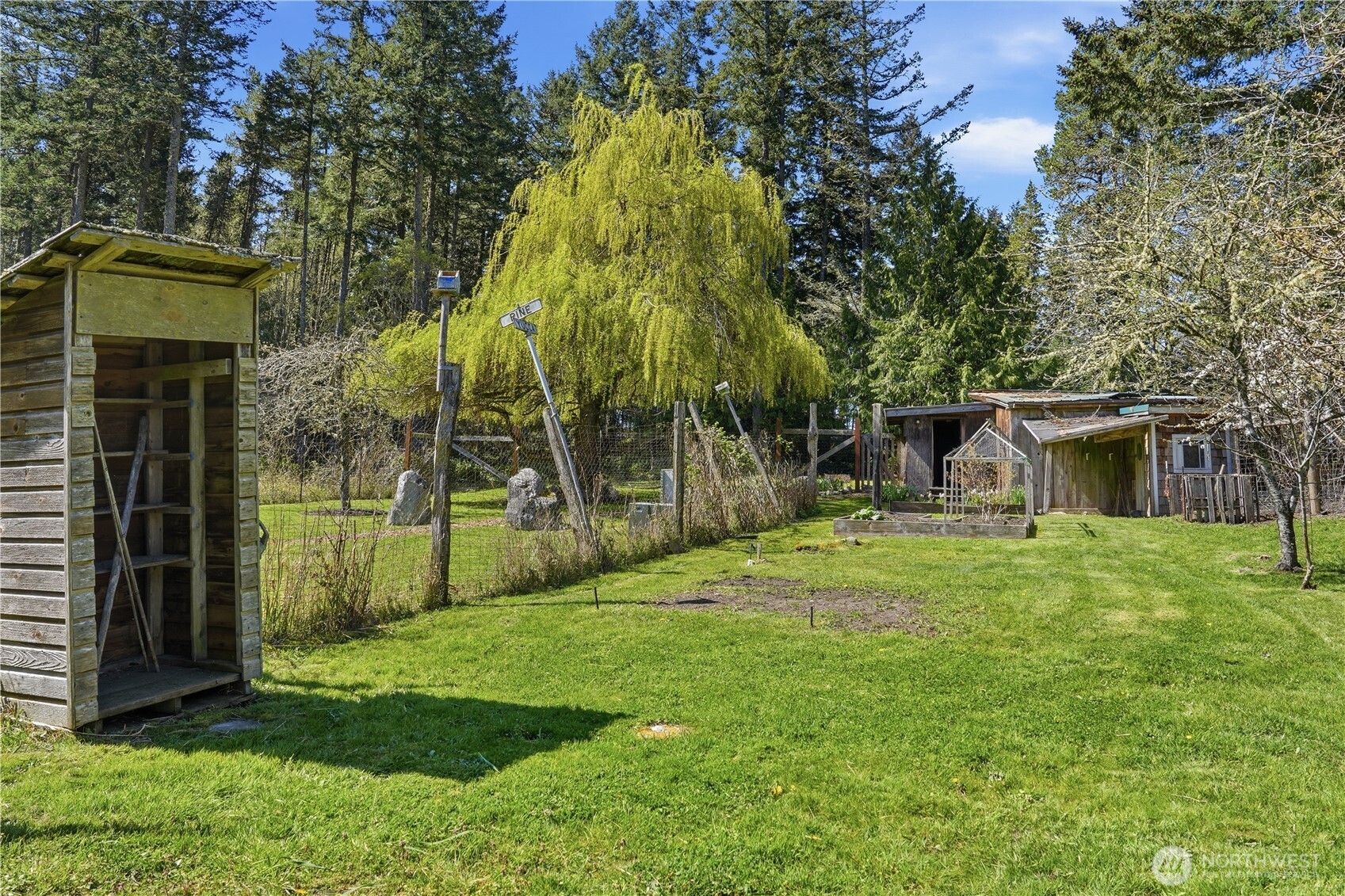 1763 Center Road Lopez Island, WA 98261 - Photo 23 of 40 front view of a house with a yard