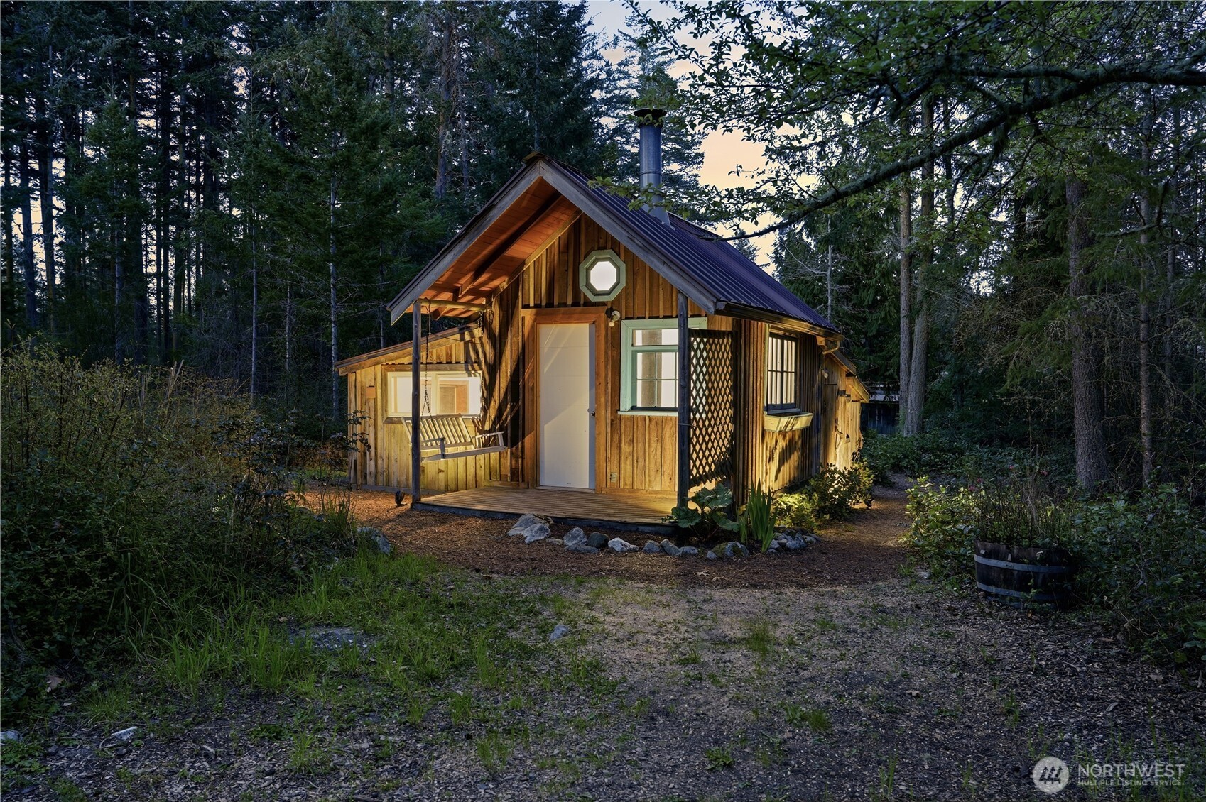 1763 Center Road Lopez Island, WA 98261 - Photo 30 of 40 a backyard of a house with lots of green space