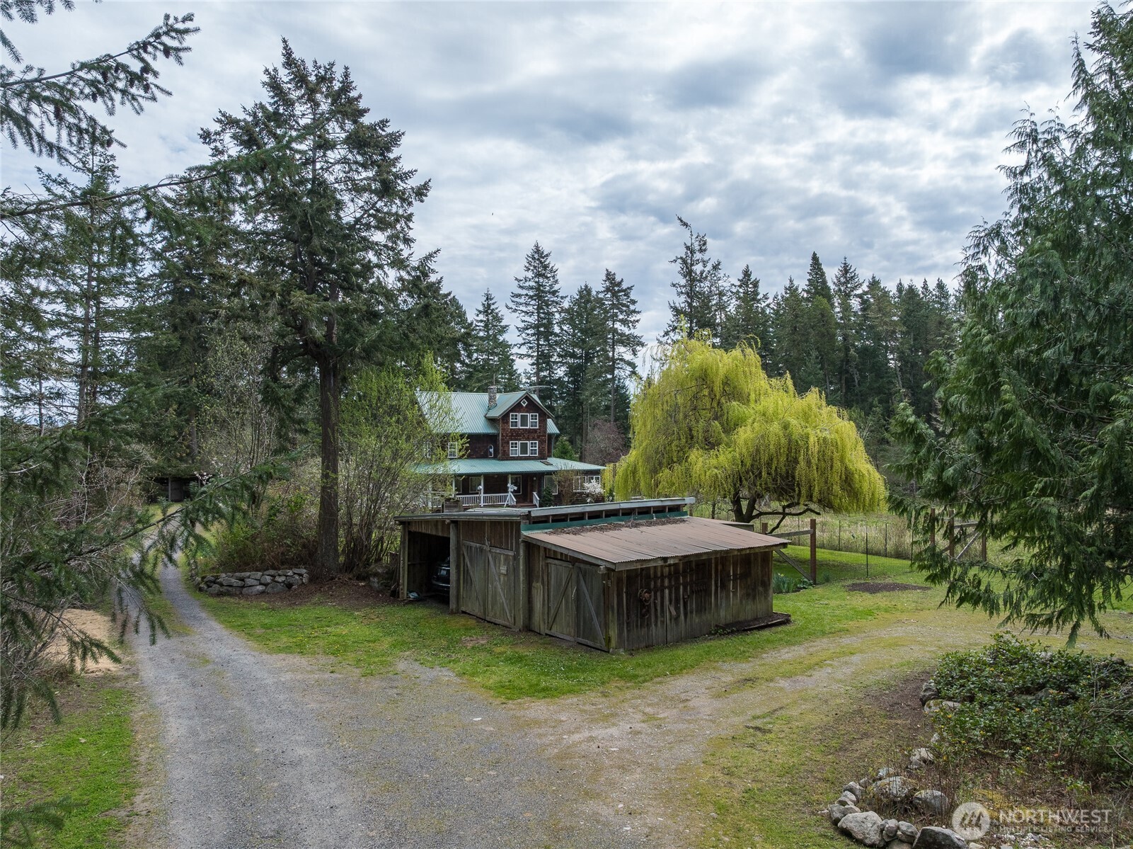 1763 Center Road Lopez Island, WA 98261 - Photo 37 of 40 a view of a backyard with swimming pool