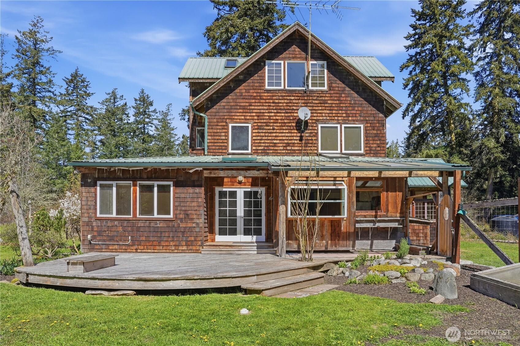 1763 Center Road Lopez Island, WA 98261 - Photo 4 of 40 a view of a house with a yard