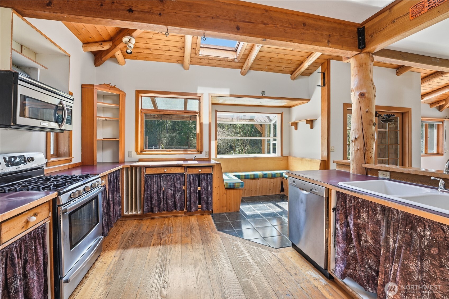 1763 Center Road Lopez Island, WA 98261 - Photo 9 of 40 a outdoor space with wooden floors and brick walls
