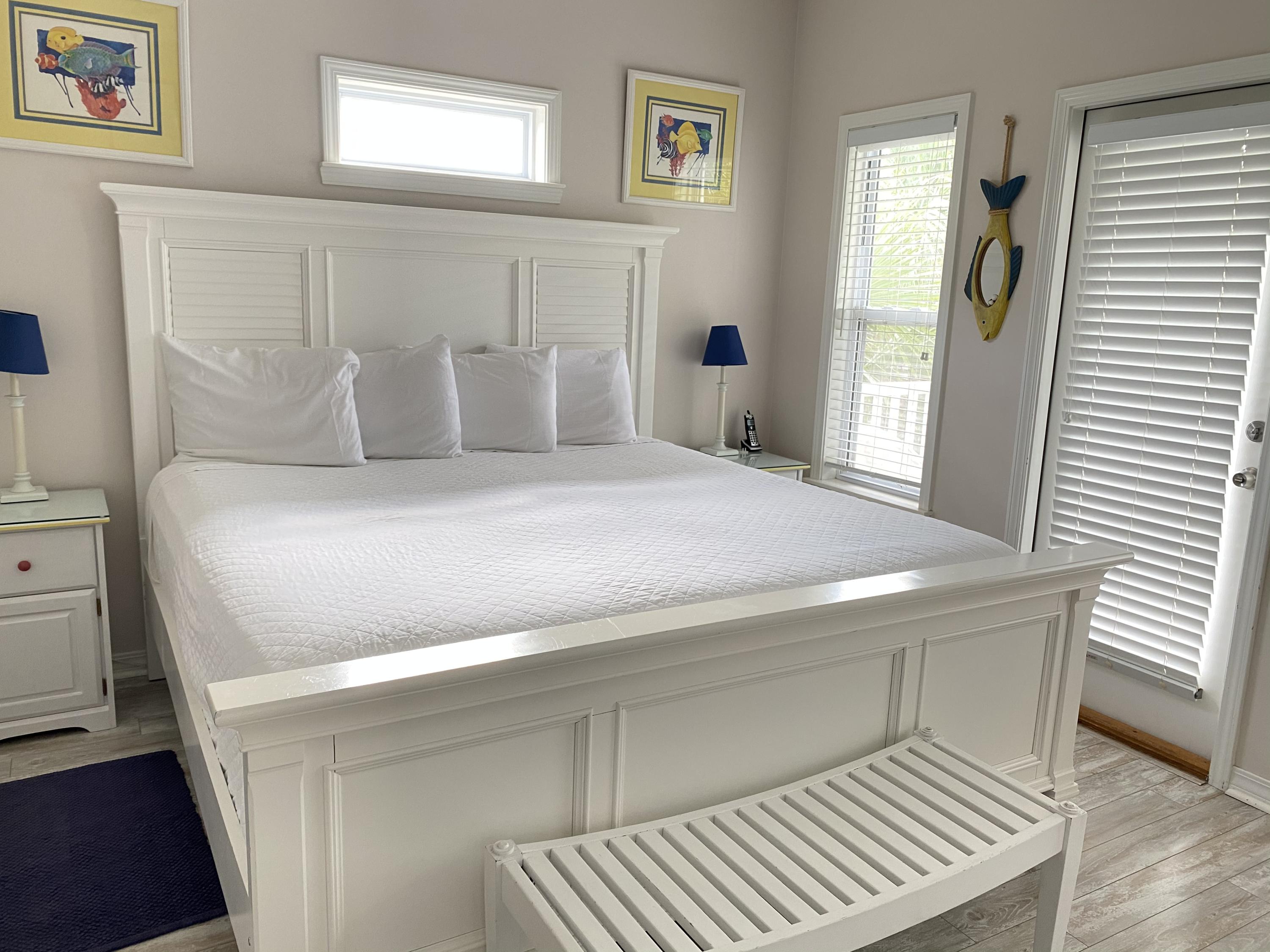 57 Emerald Dunes Circle Santa Rosa Beach, FL 32459 - Photo 11 of 26 a bedroom with a bed and a window