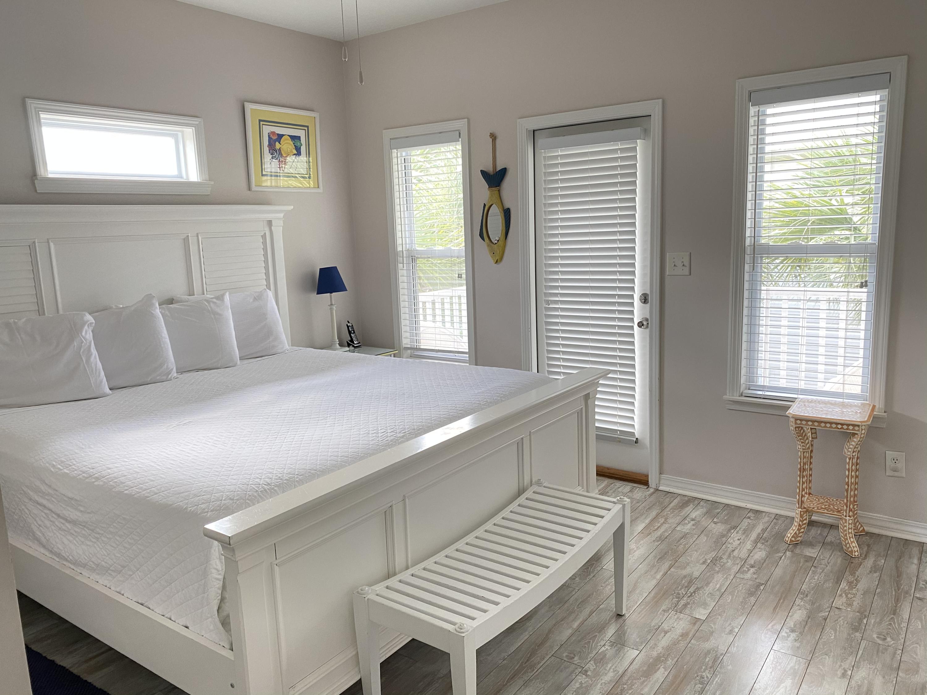 57 Emerald Dunes Circle Santa Rosa Beach, FL 32459 - Photo 12 of 26 a bedroom with a bed and a window