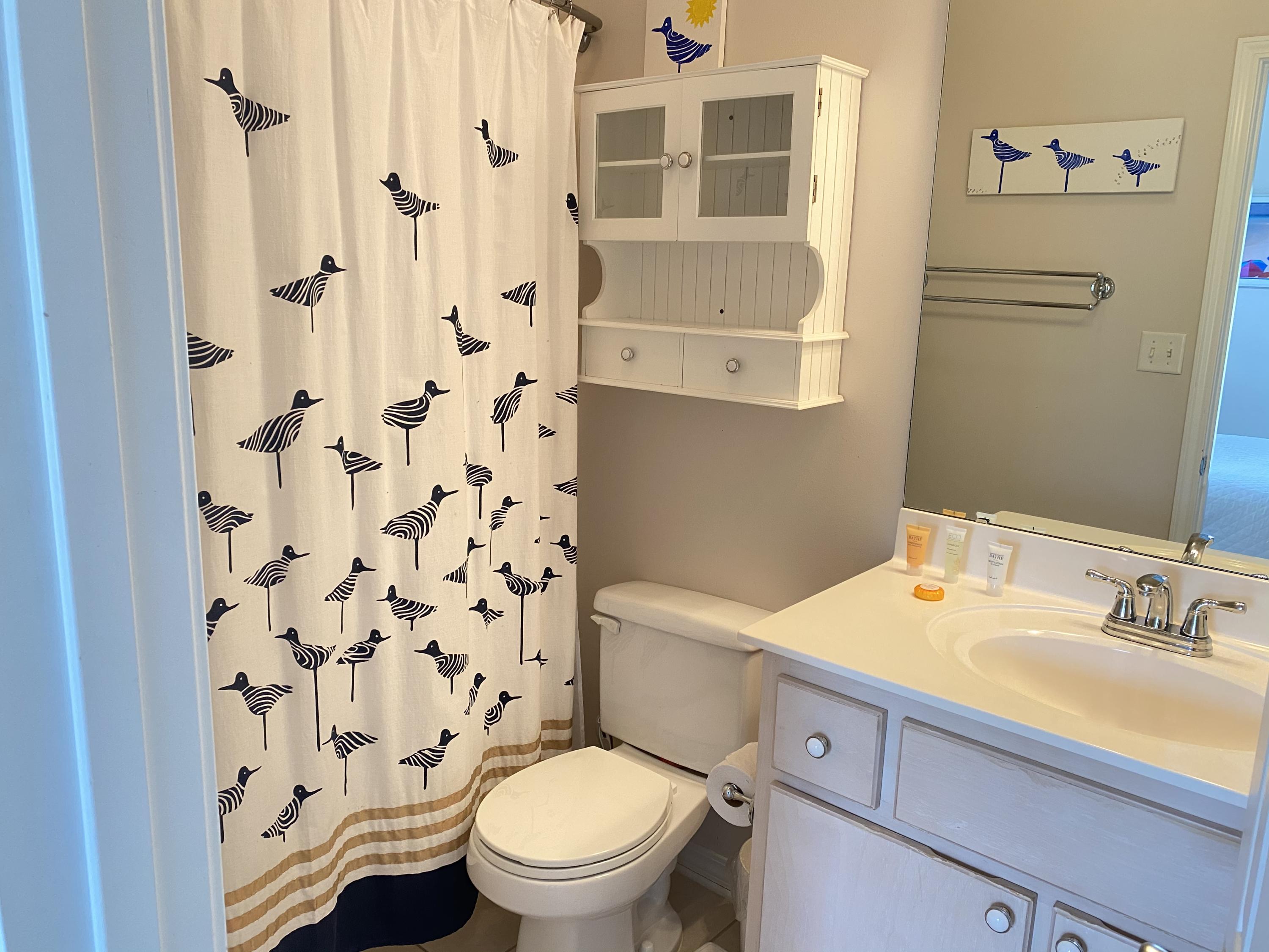 57 Emerald Dunes Circle Santa Rosa Beach, FL 32459 - Photo 17 of 26 a bathroom with a sink toilet and shower