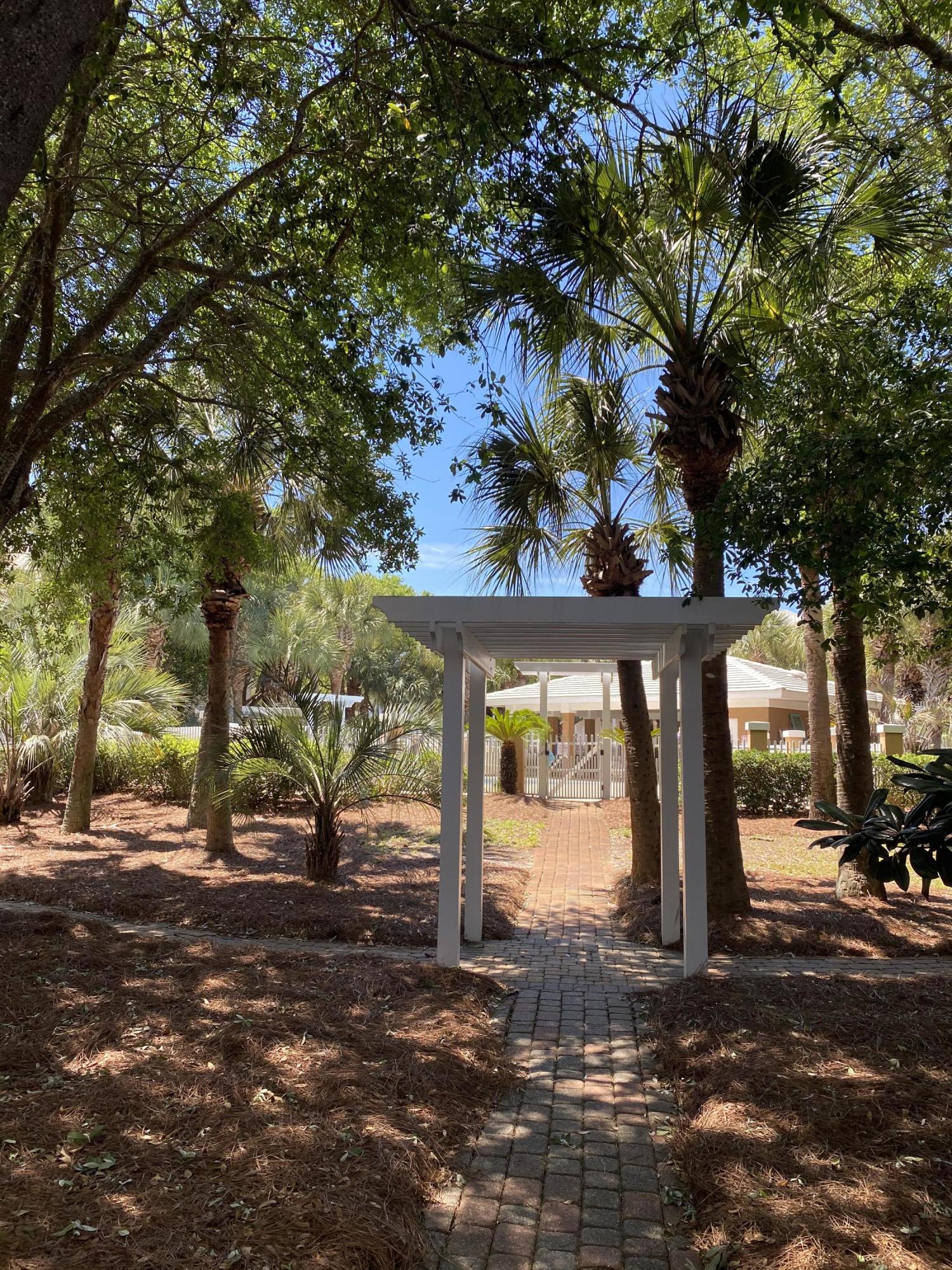 57 Emerald Dunes Circle Santa Rosa Beach, FL 32459 - Photo 23 of 26 a view of a street with a building