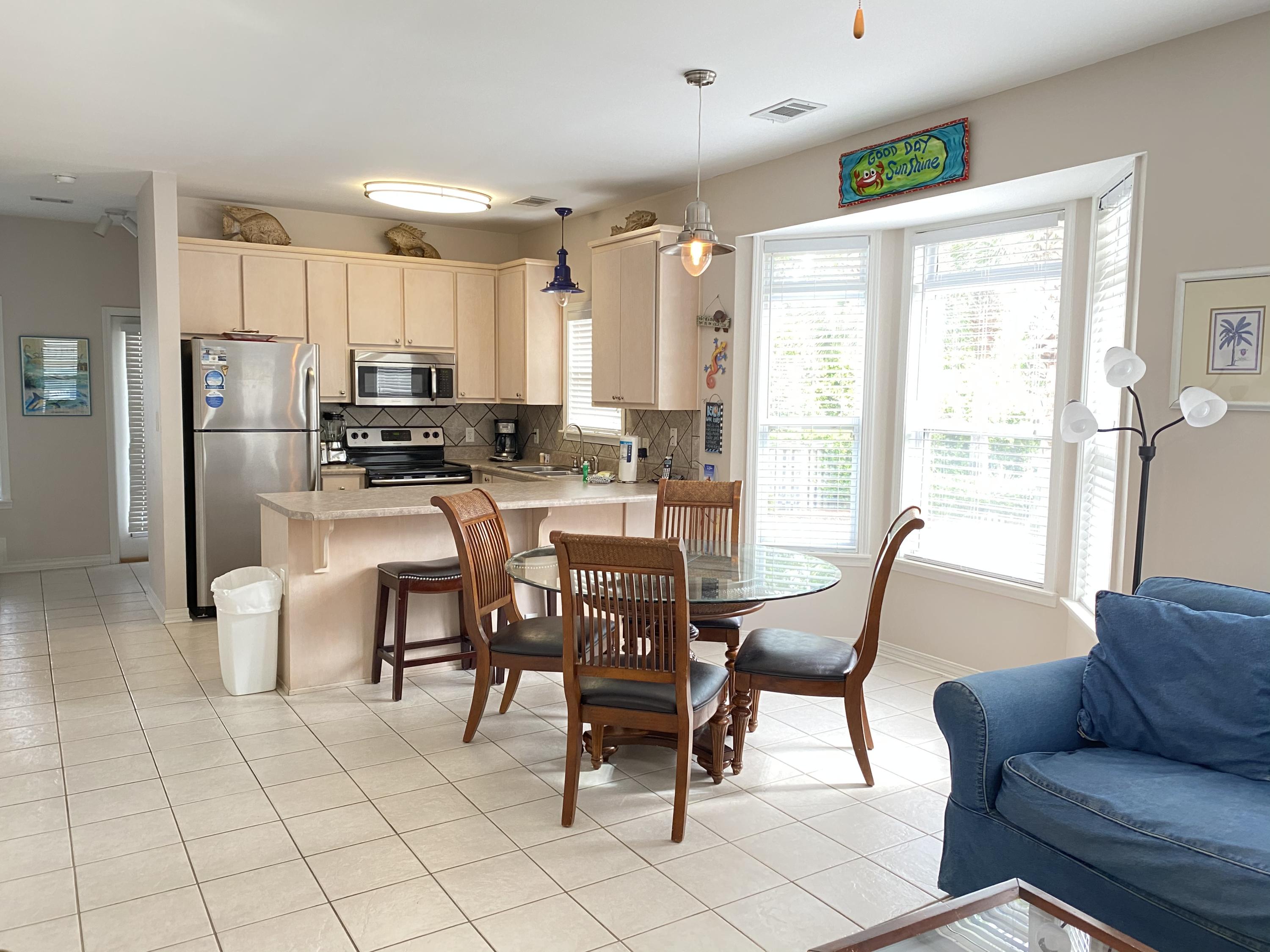 57 Emerald Dunes Circle Santa Rosa Beach, FL 32459 - Photo 6 of 26 a view of a dining room with furniture