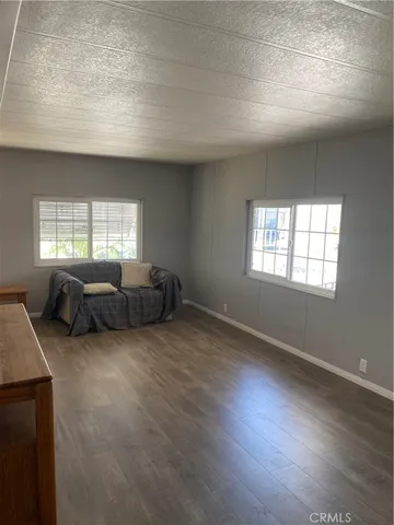 a bed room with bed and a window