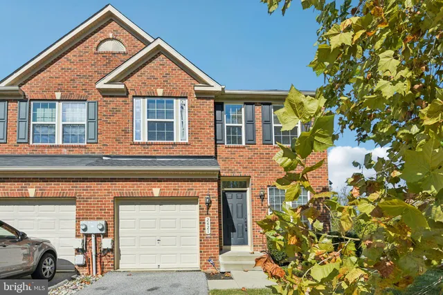 front view of a house with a small yard